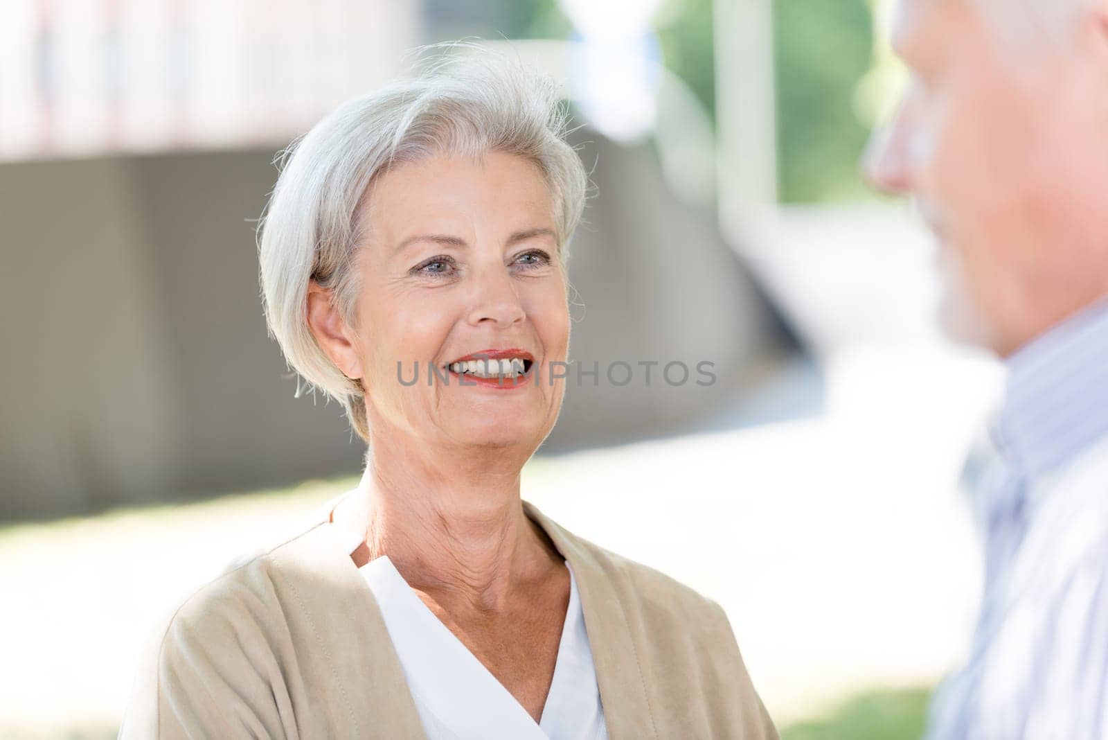 Active senior couple against an urban background