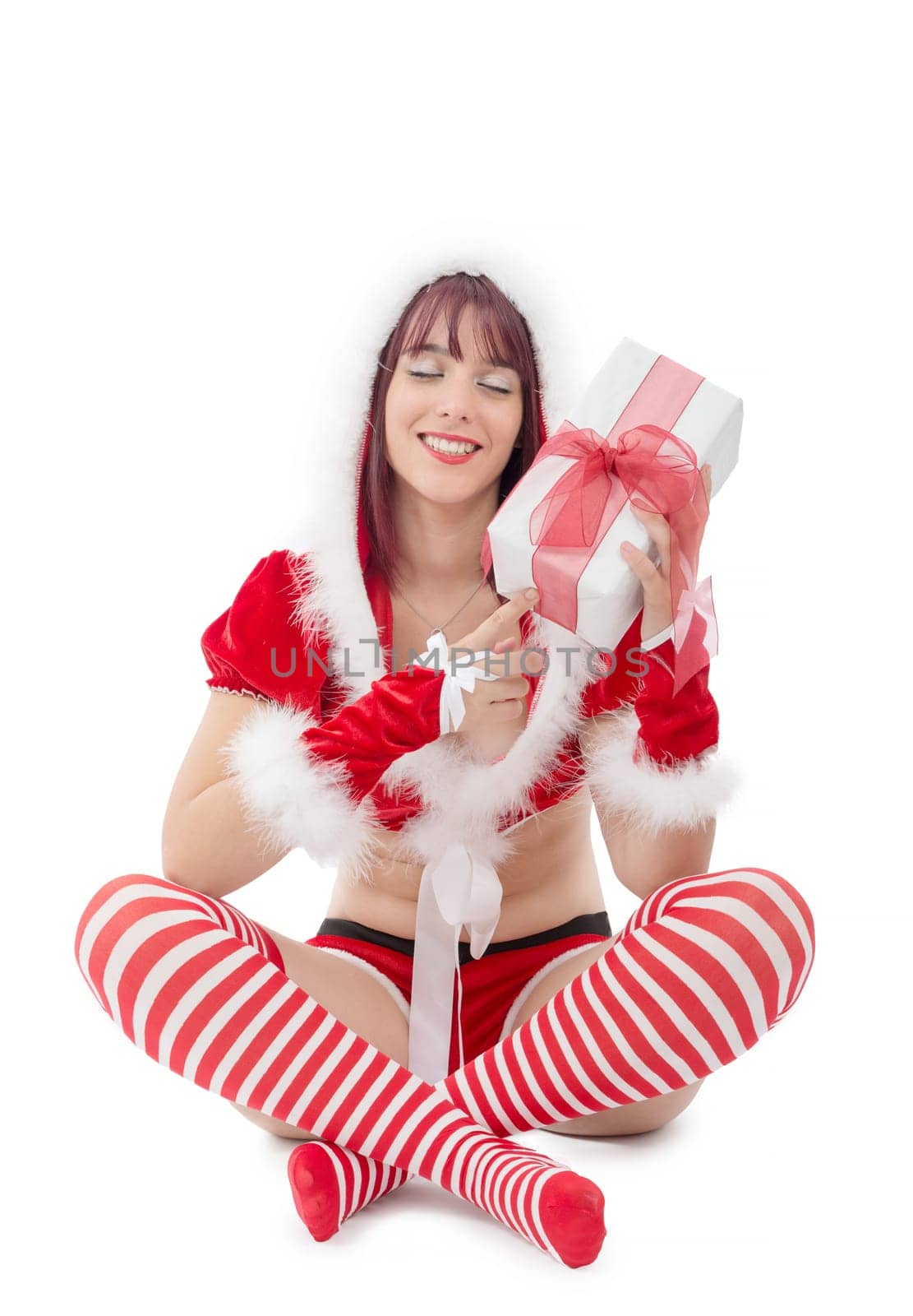 a portrait of beautiful girl wearing santa claus clothes