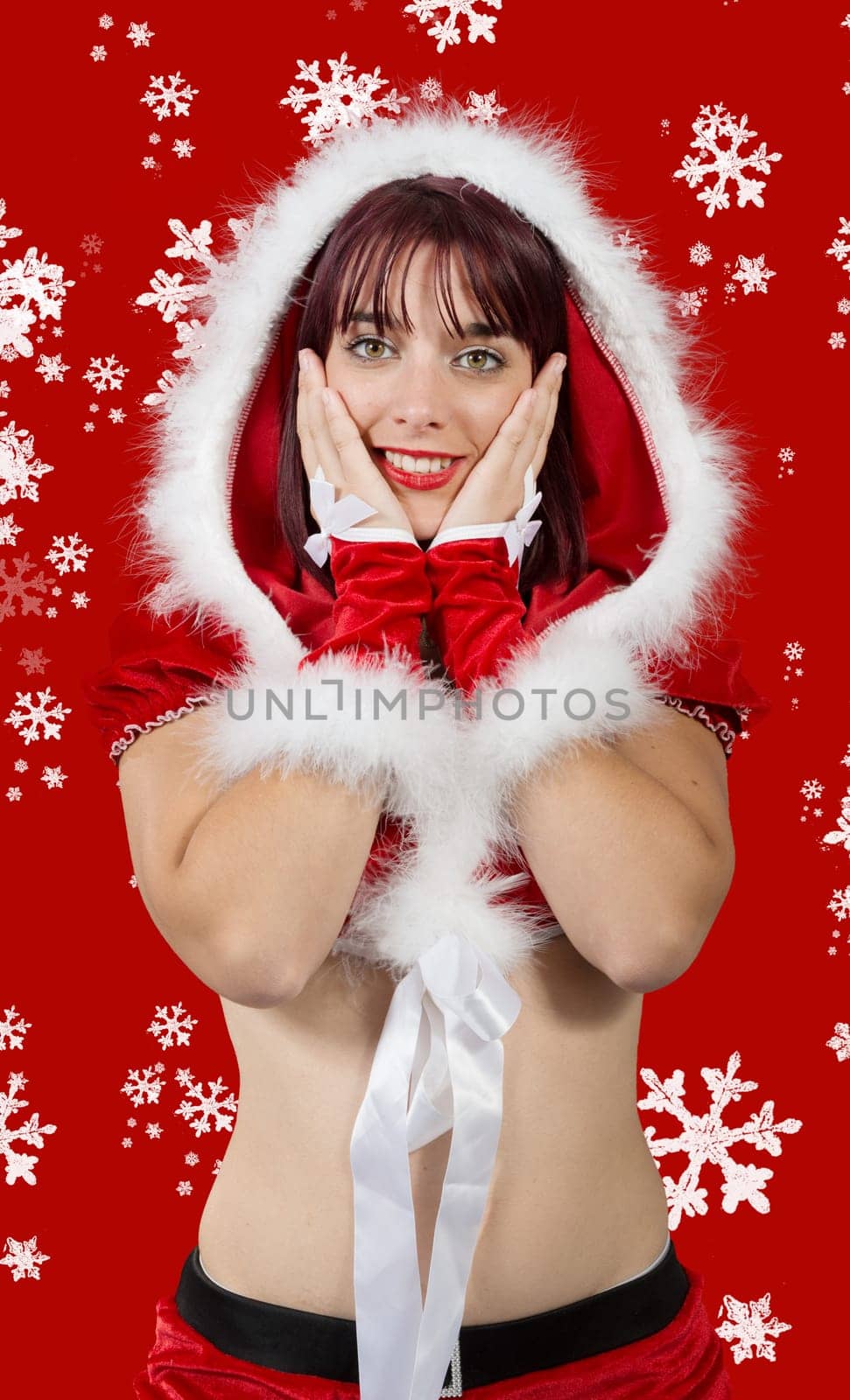 a portrait of beautiful girl wearing santa claus clothes