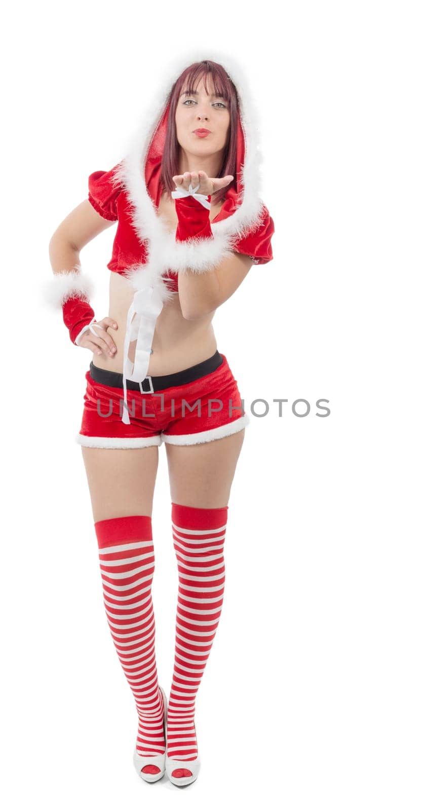Smiling girl in santa clause costume on white