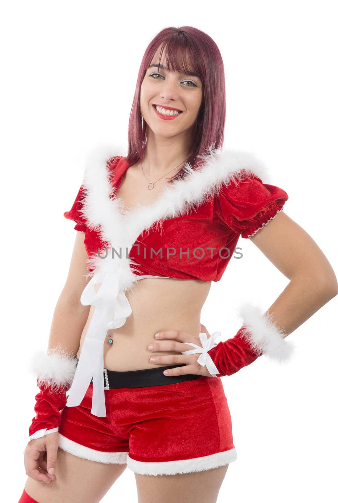 a portrait of beautiful  girl wearing santa claus clothes