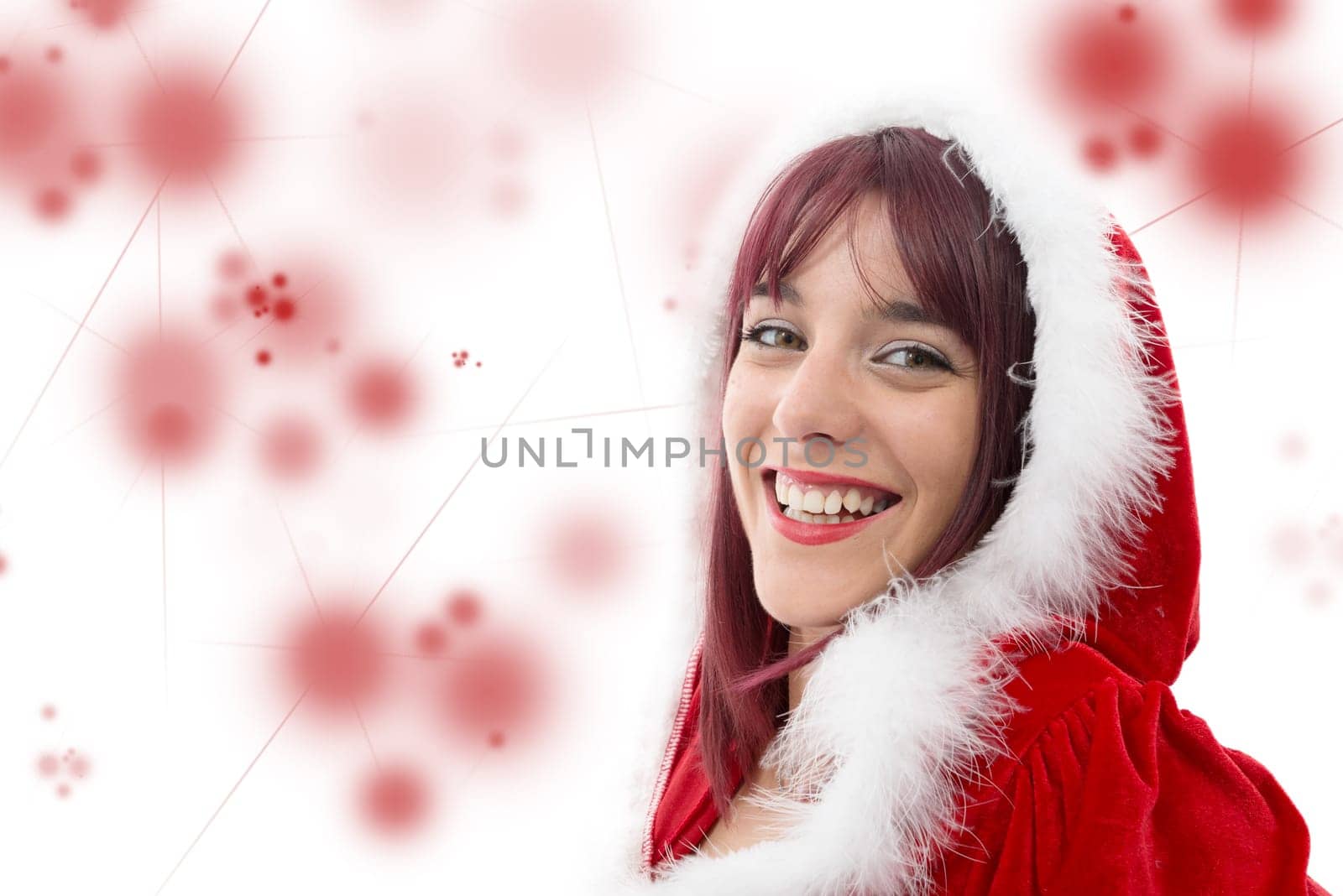a portrait of beautiful  girl wearing santa claus clothes