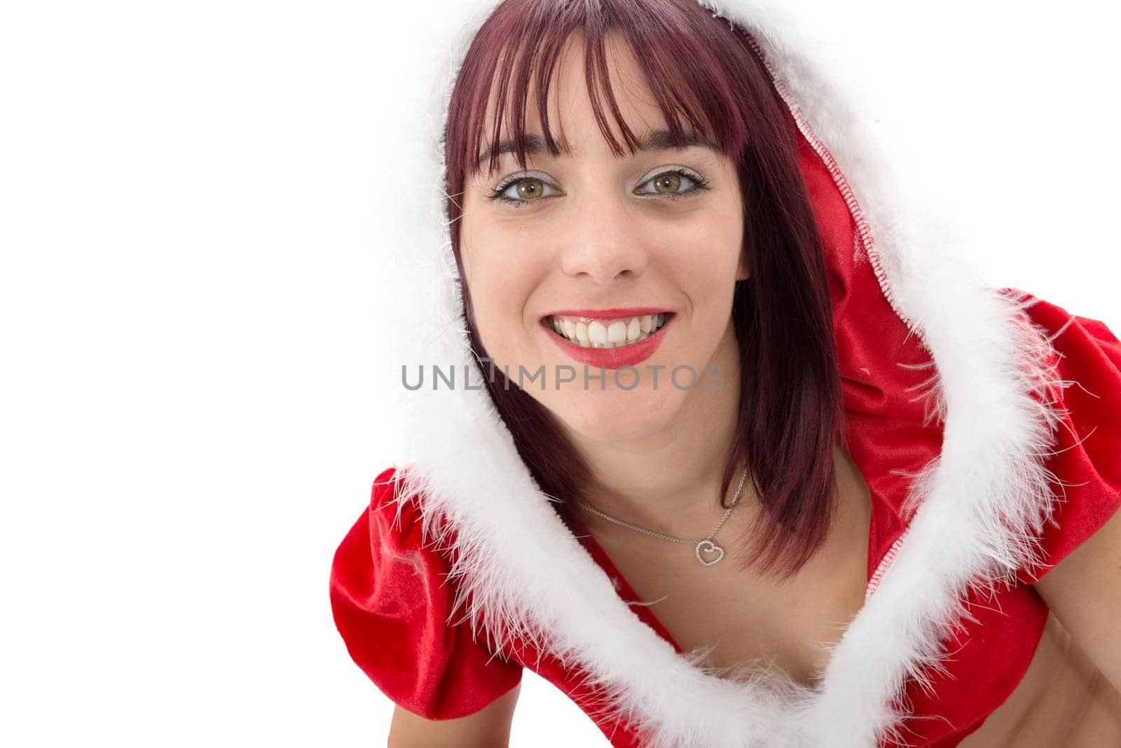 a portrait of beautiful  girl wearing santa claus clothes