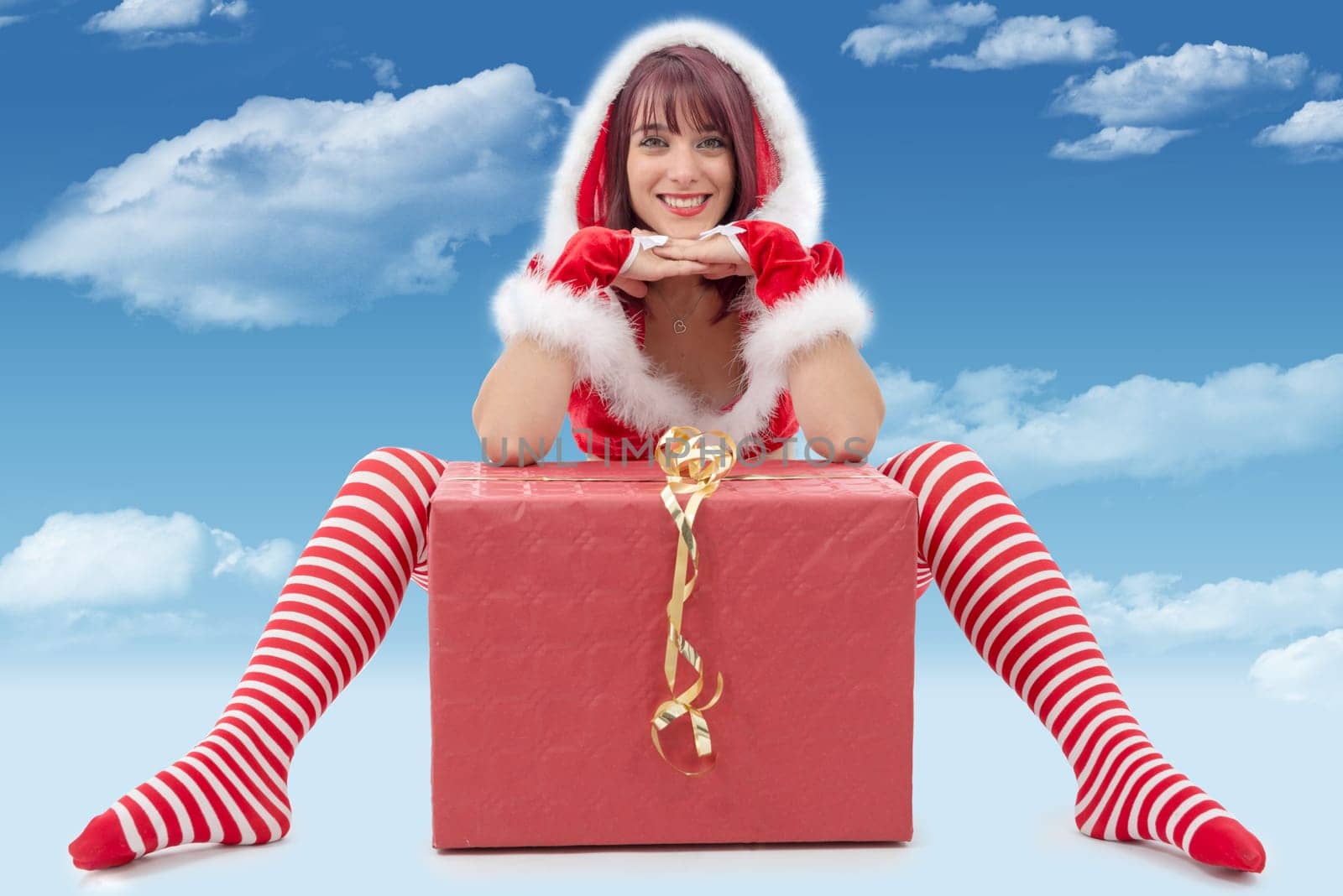 a beautiful sexy girl wearing santa claus clothes