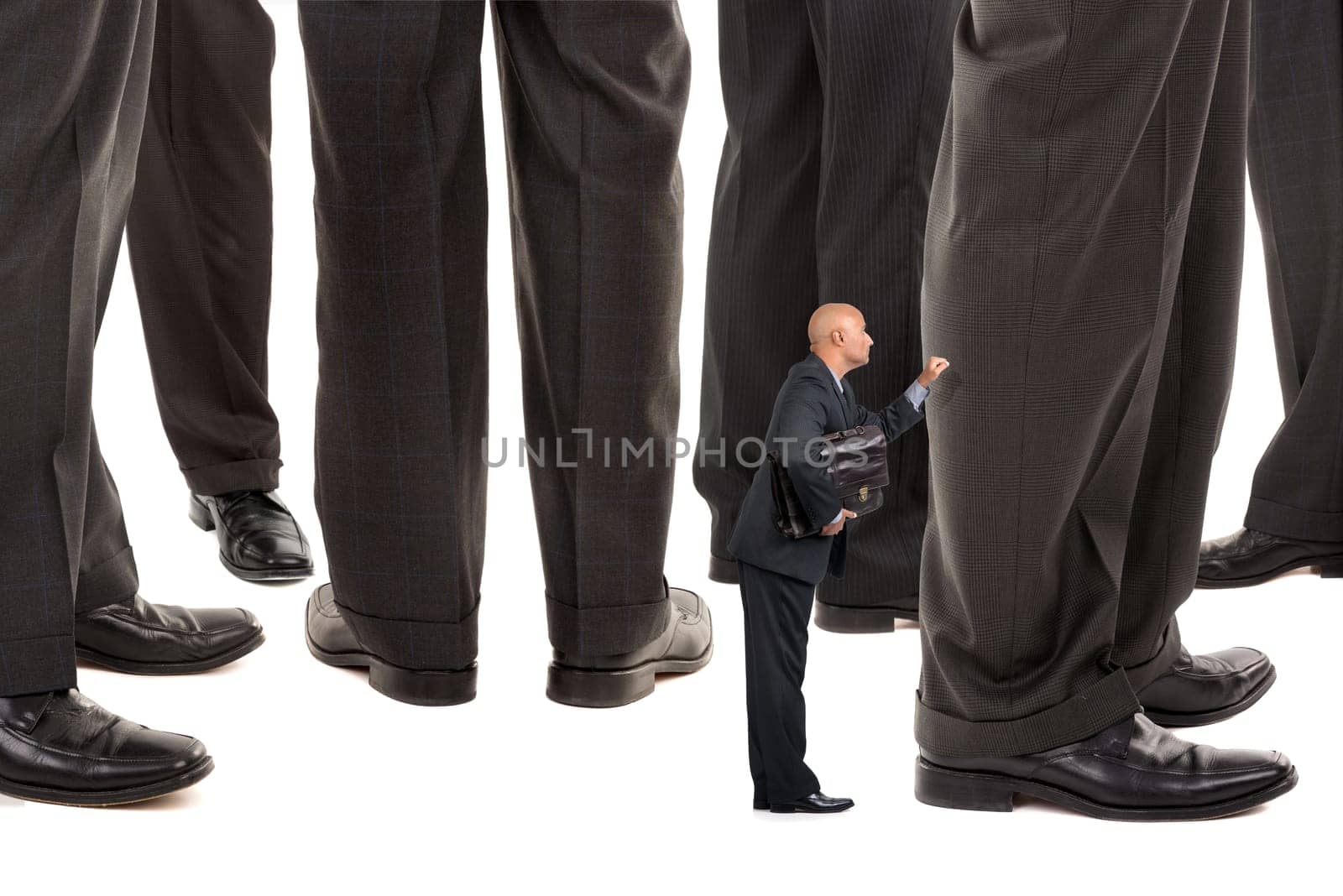 Small businessman trying to reach big business players