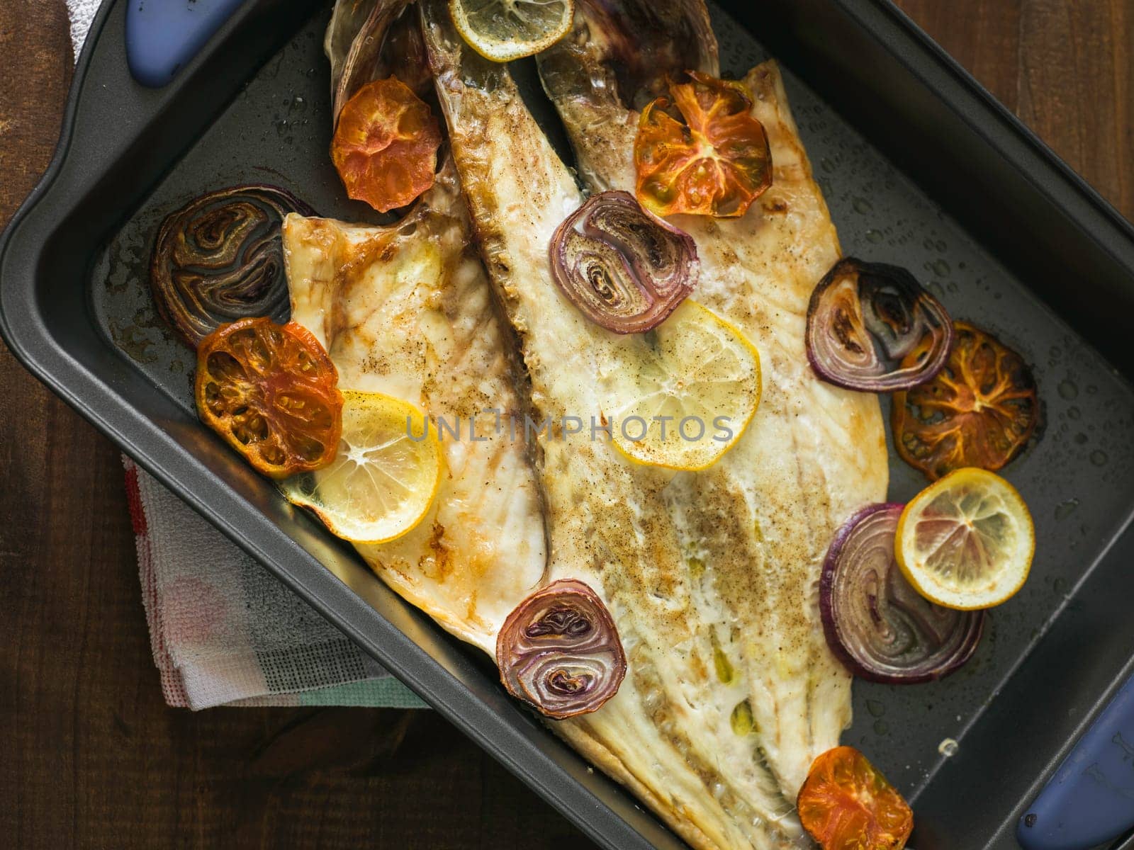 just roasted fish with vegetables in the oven