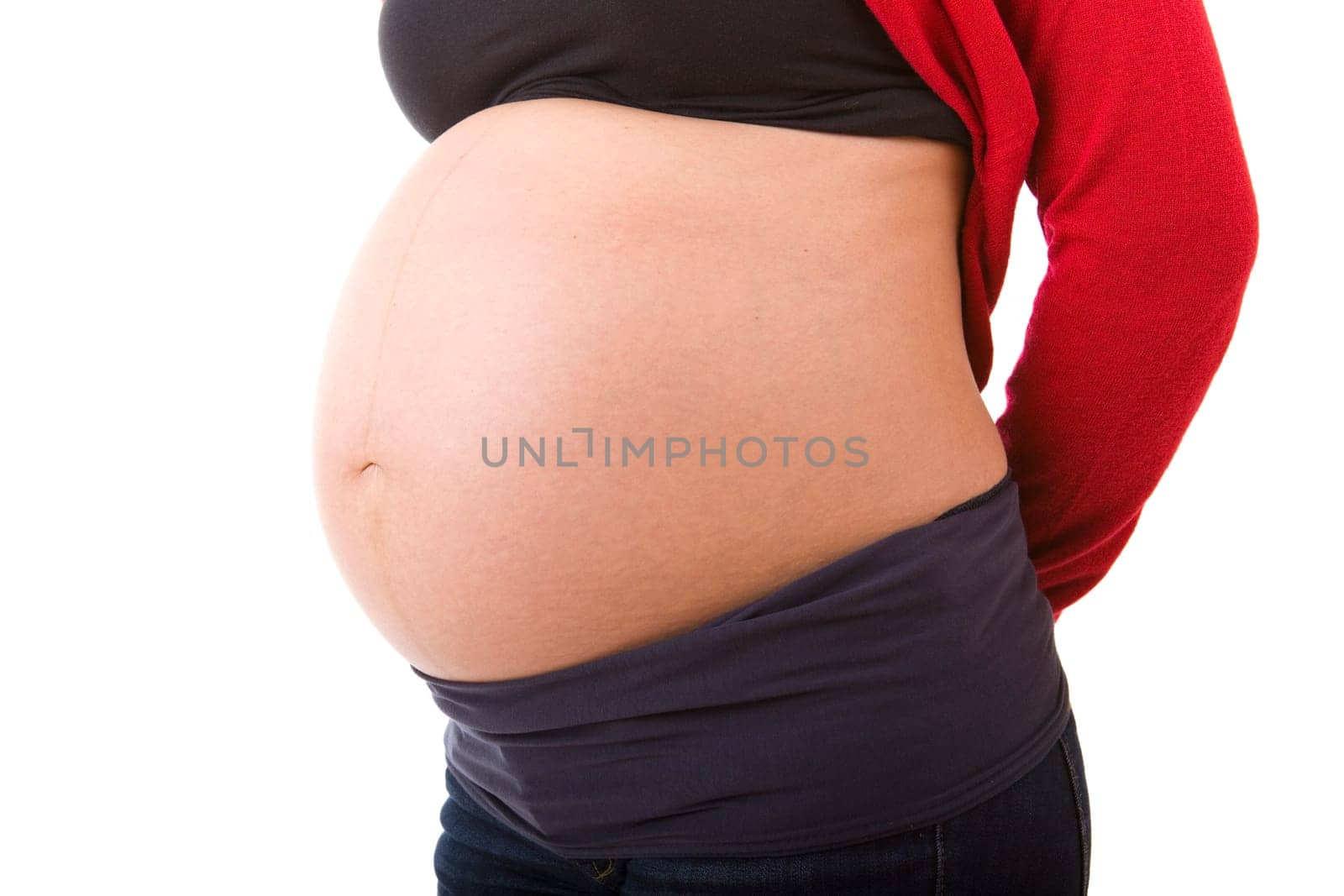 Closeup of pregnant woman at white background