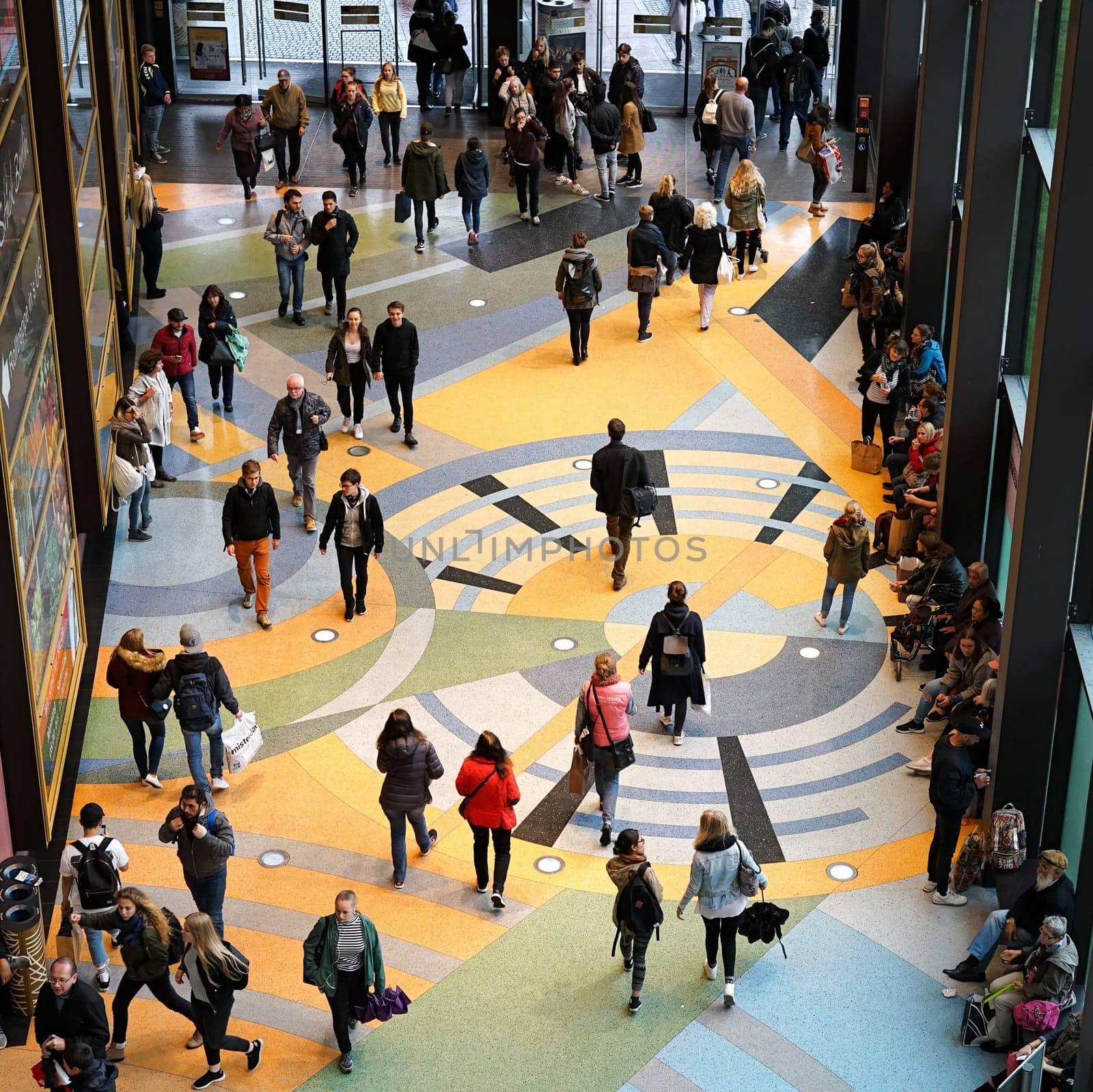 People in the Alexa shopping center in downtown Berlin