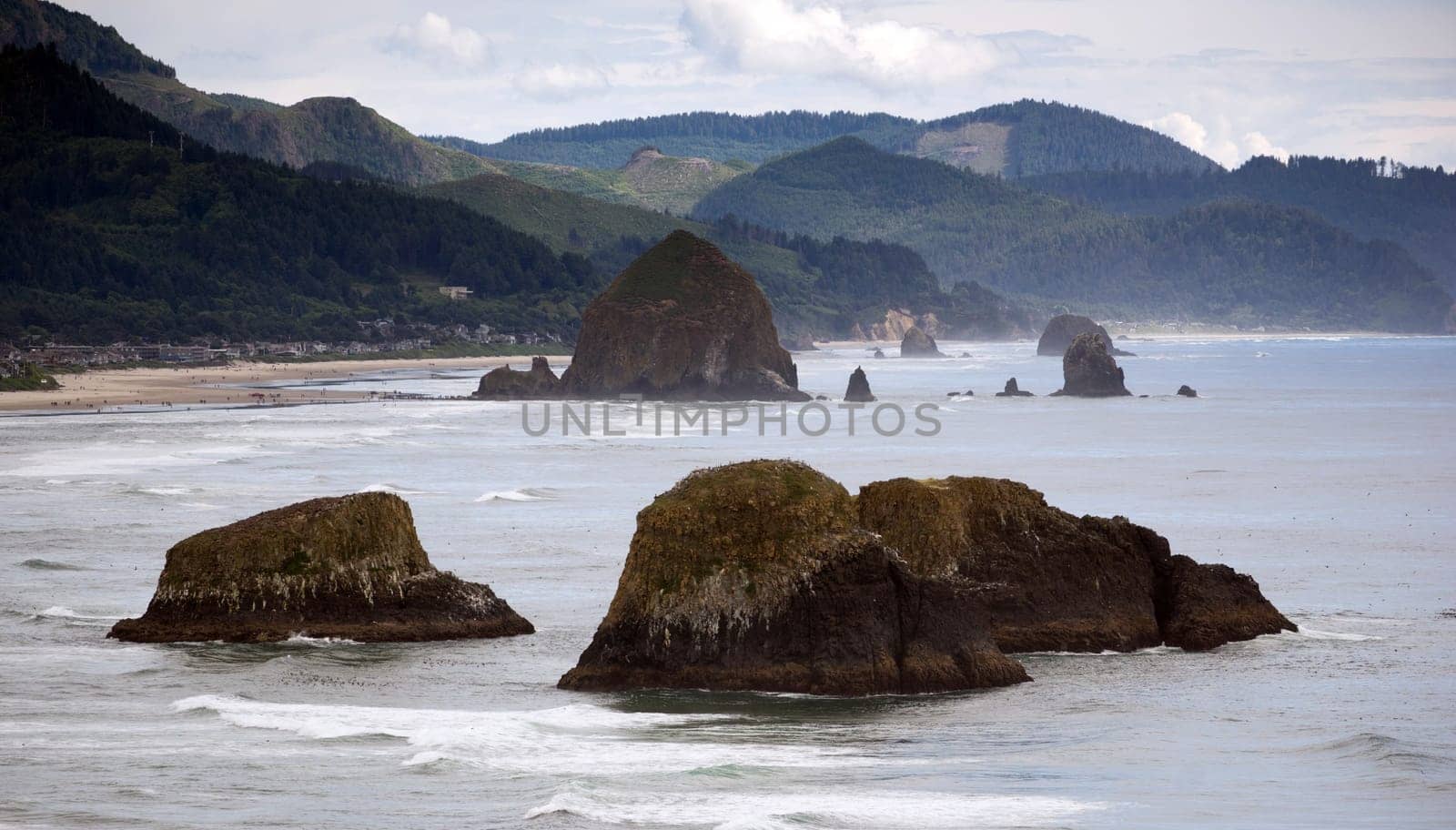 Waves and mist come in from the Pacific to Seaside