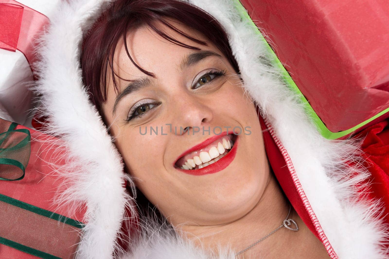 christmas. portrait of beautiful sexy girl wearing santa claus clothes