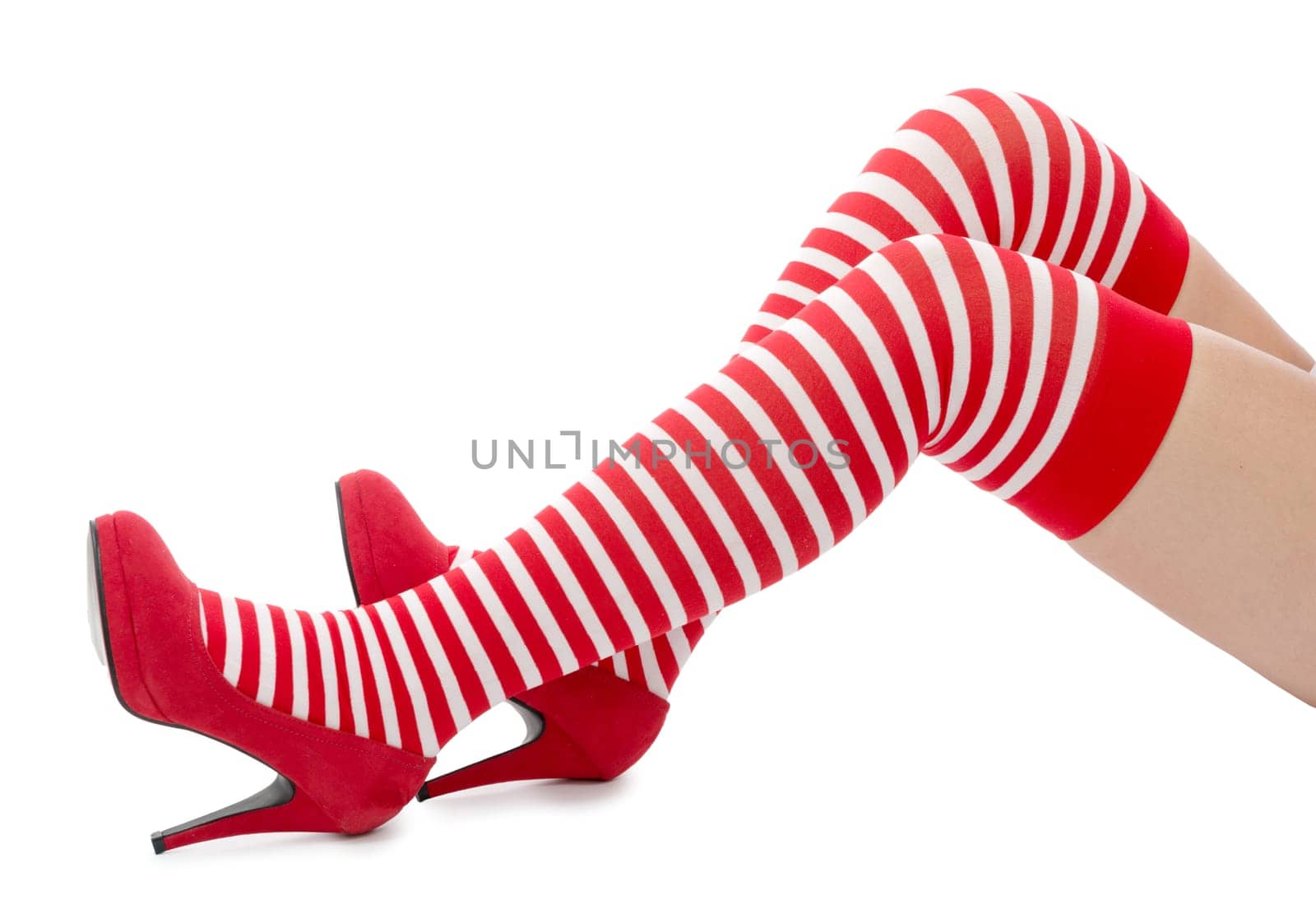 Sexy Santa woman legs isolated on white background