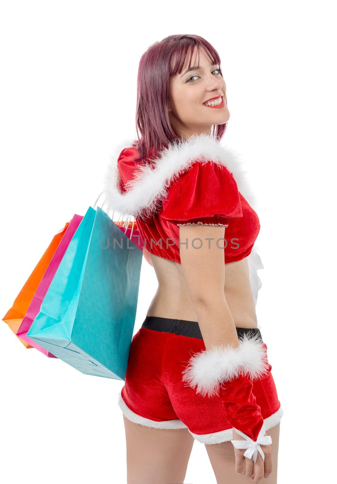 a beautiful Santa Claus woman holding shopping bags
