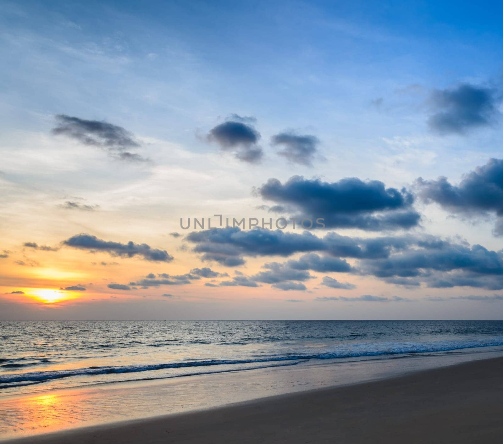 Tropical beach sunset with beautiful cloudscape skyline