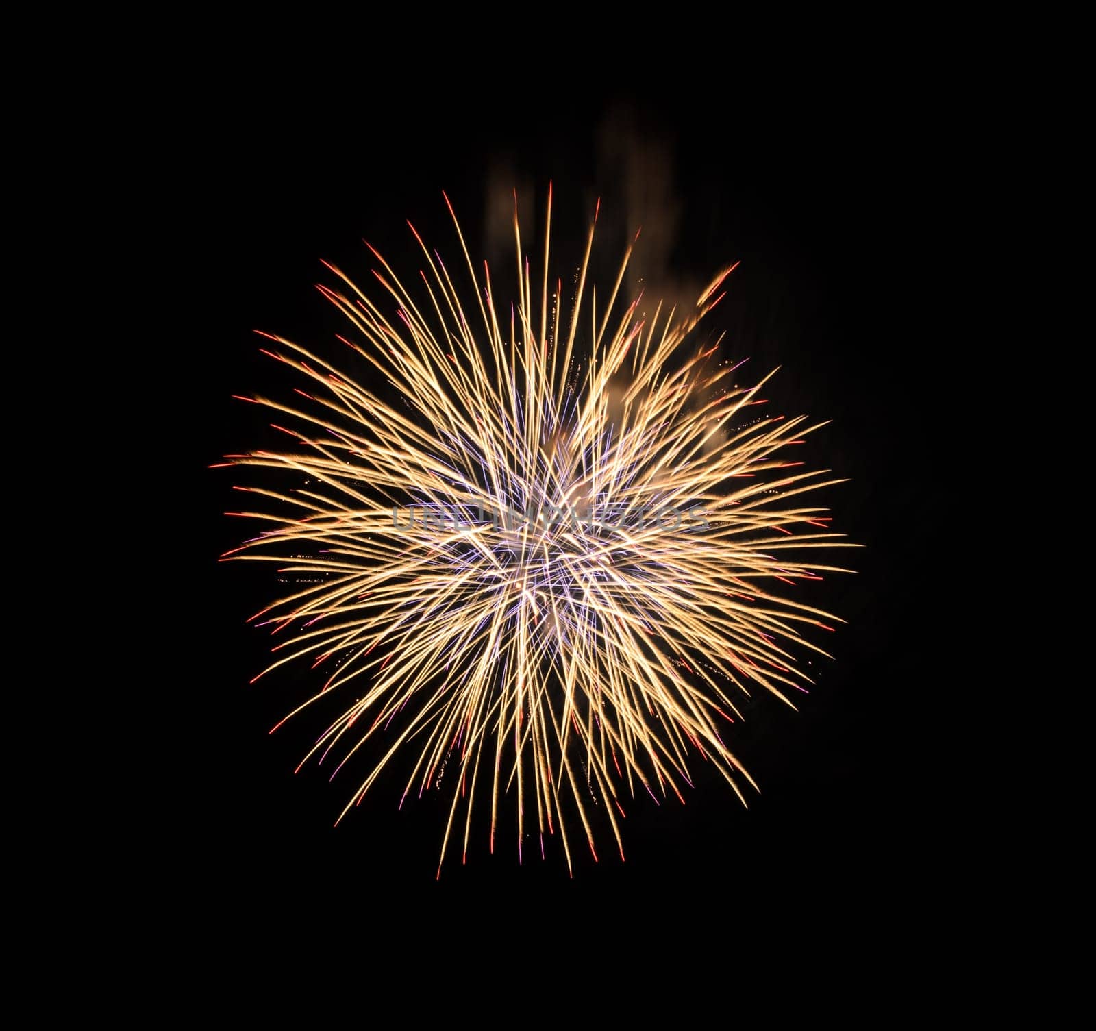 Yellow fireworks on night sky background