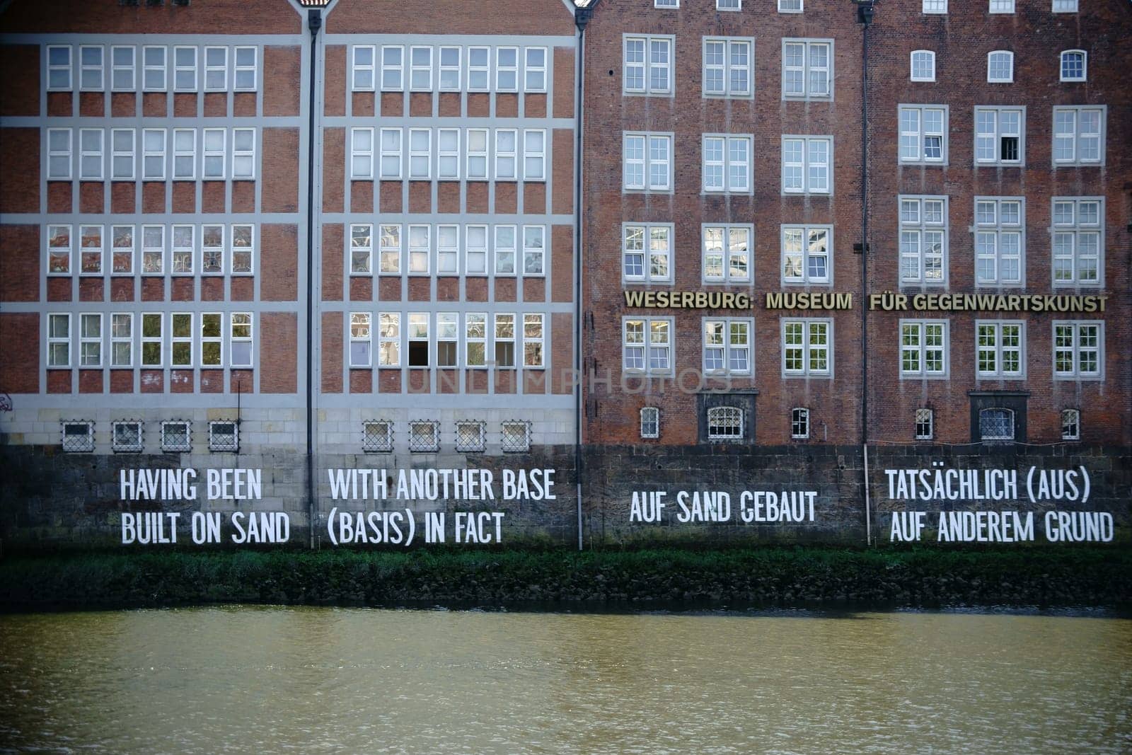 Bremen,Germany - August 30,2016: The façade of the Weserburg Museum,a brick building on the banks of the Weser river,on August 30,2016 in Bremen.
