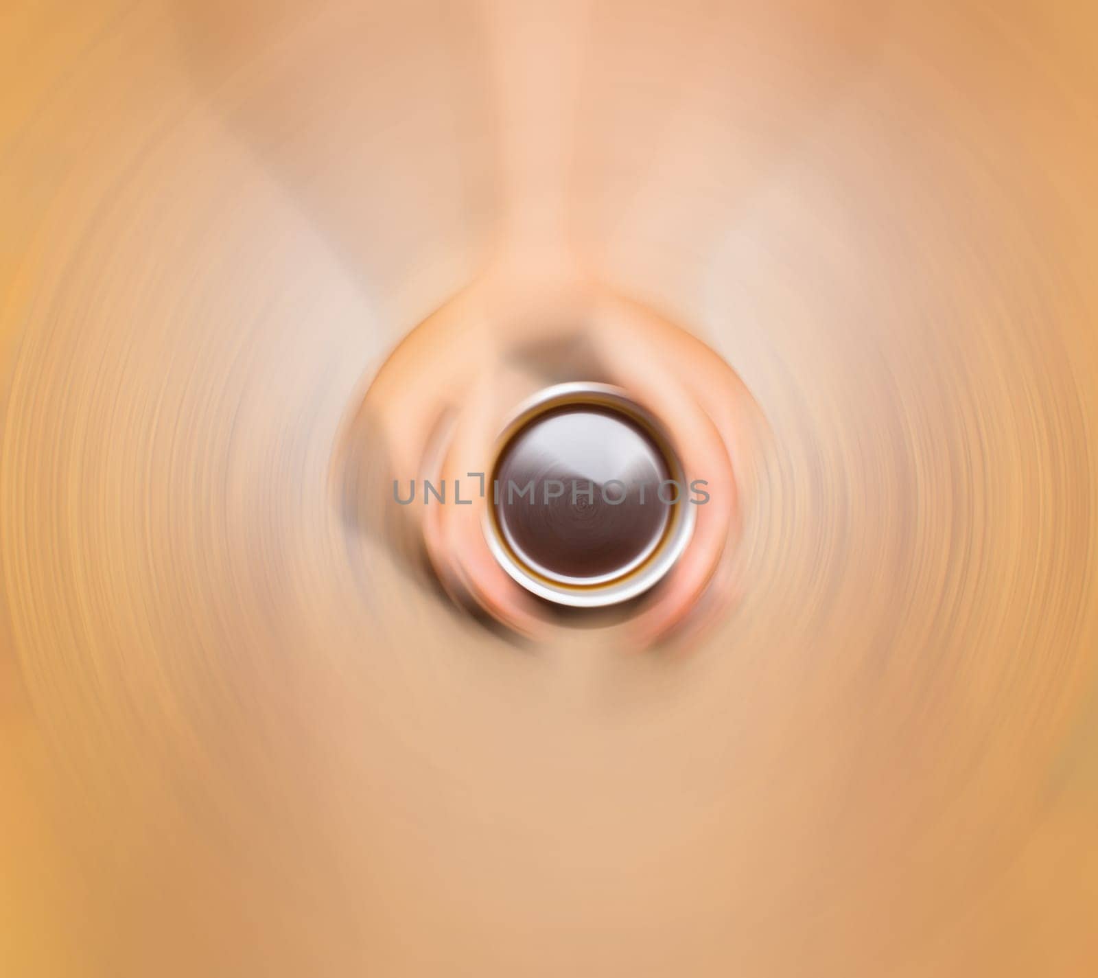 Female hands holding cup of coffee on wooden background, blurred in postproduction