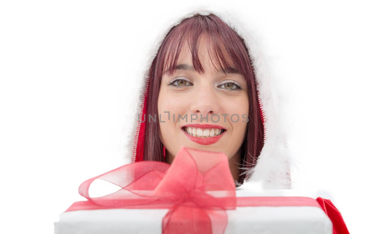 christmas. portrait of beautiful  girl wearing santa claus clothes