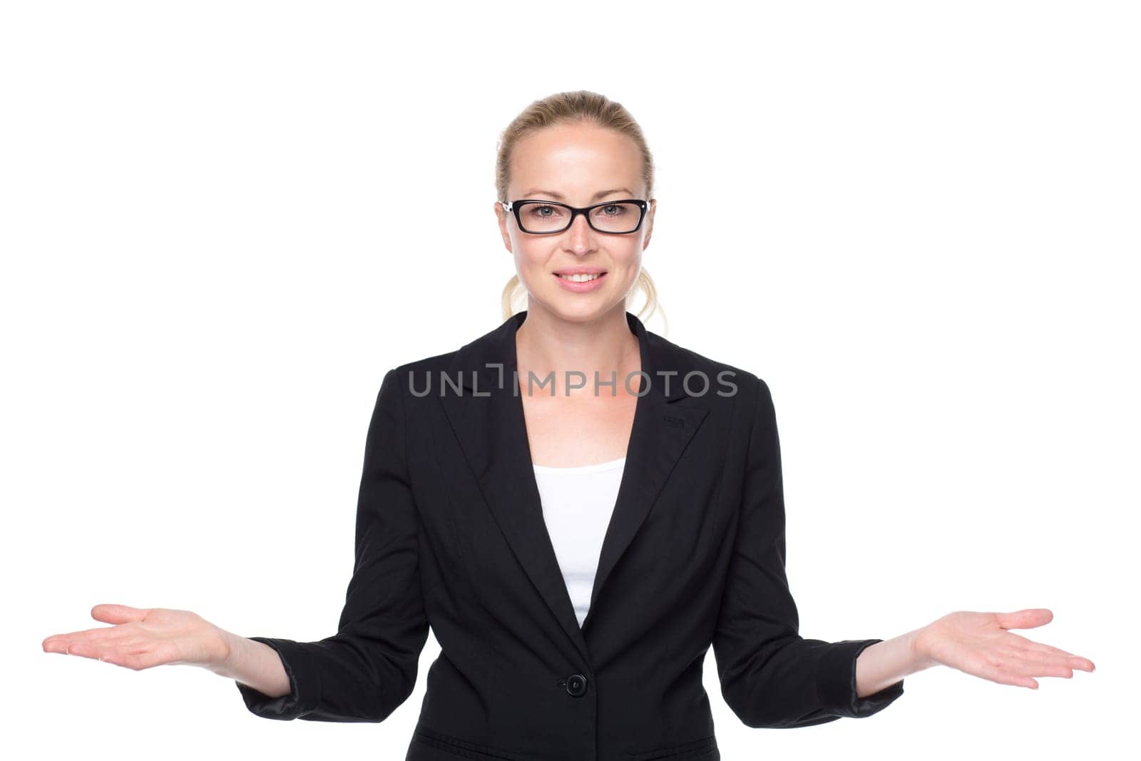 Beautiful young businesswoman smiling, holding open palms with empty copy space. Business woman showing hands sign to sides, concept of advertisement or comparing products. White background.