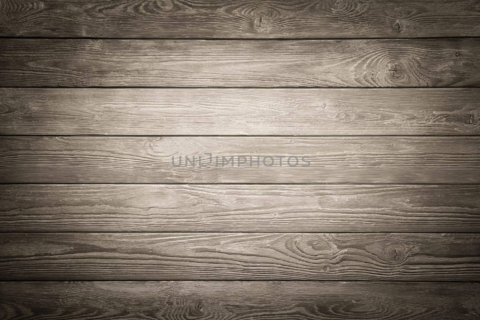 Rustic wood board background with nice studio lighting and elegant vignetting to draw the attention