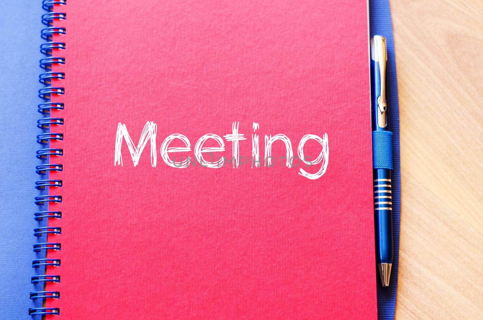 Meeting text concept write on notebook