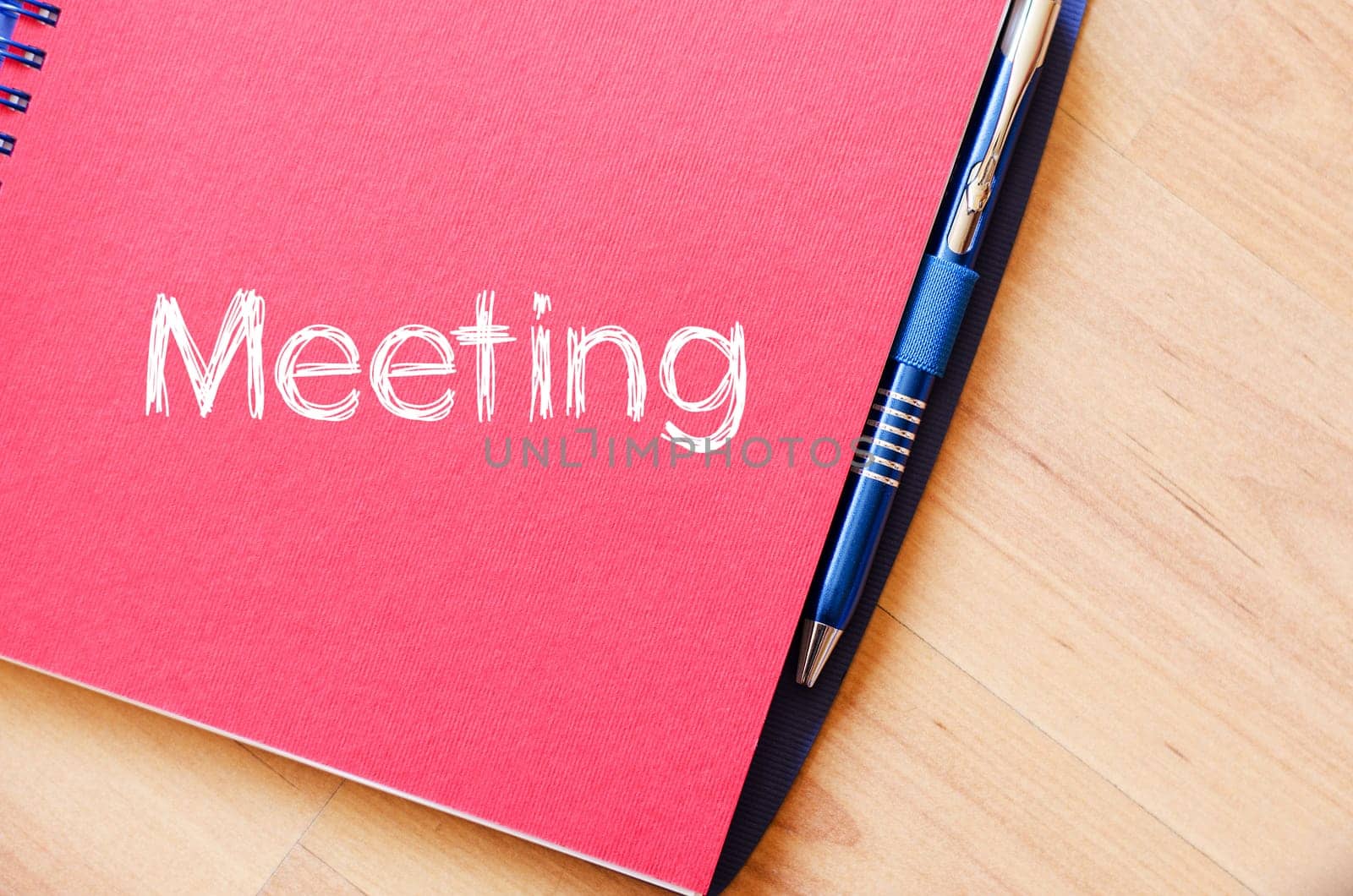 Meeting text concept write on notebook