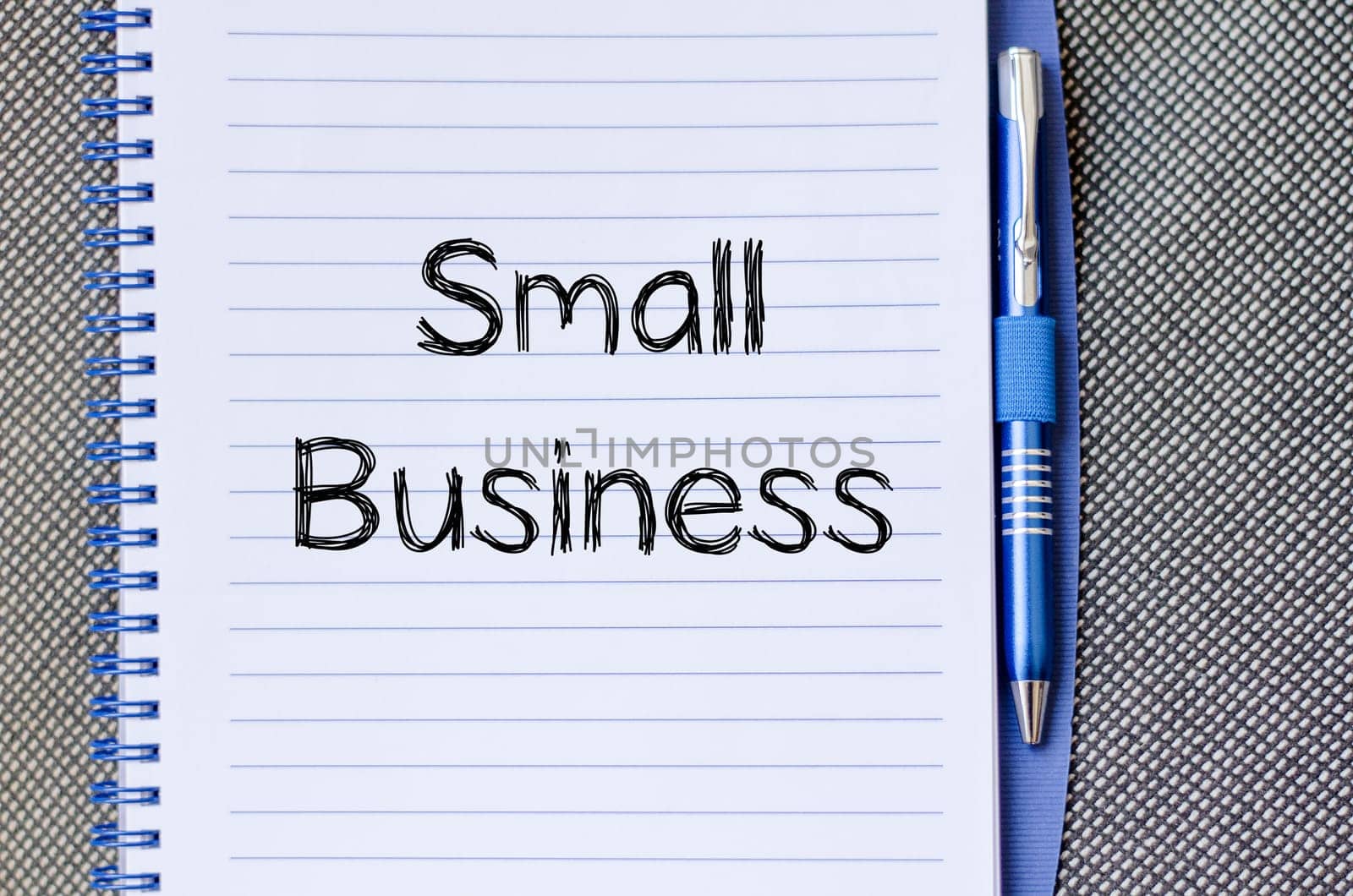 Small business text concept write on notebook