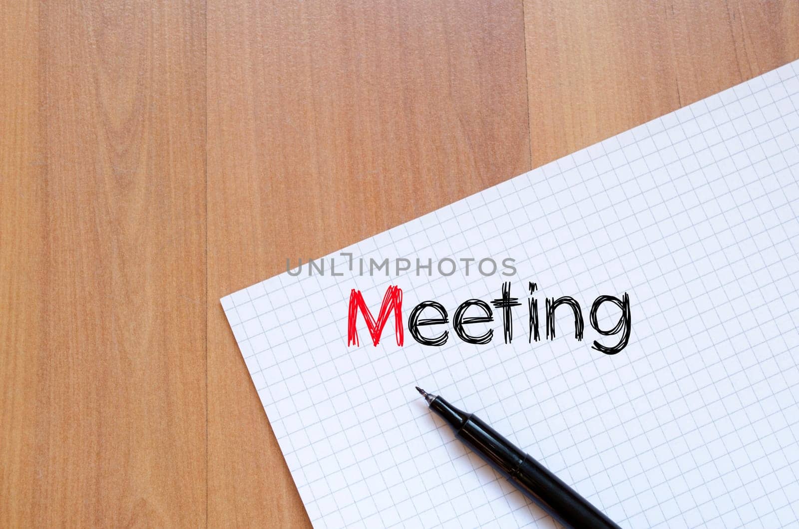 Meeting text concept write on notebook