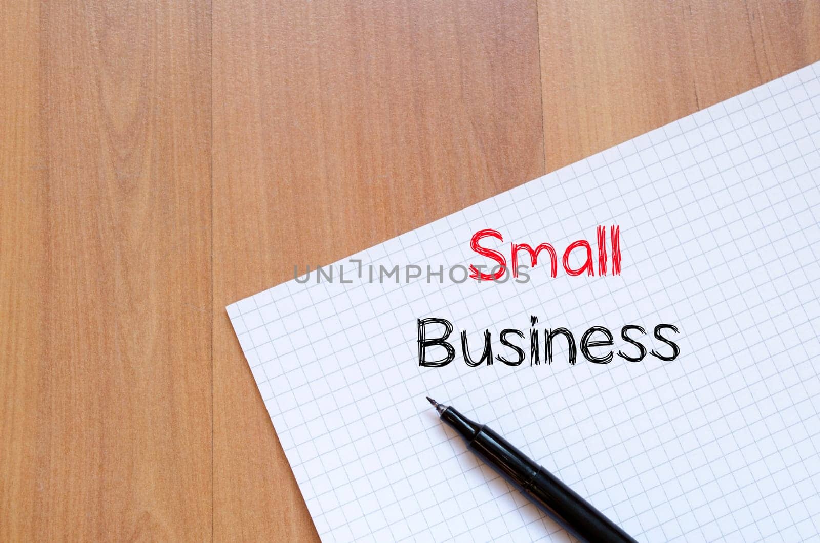 Small business text concept write on notebook