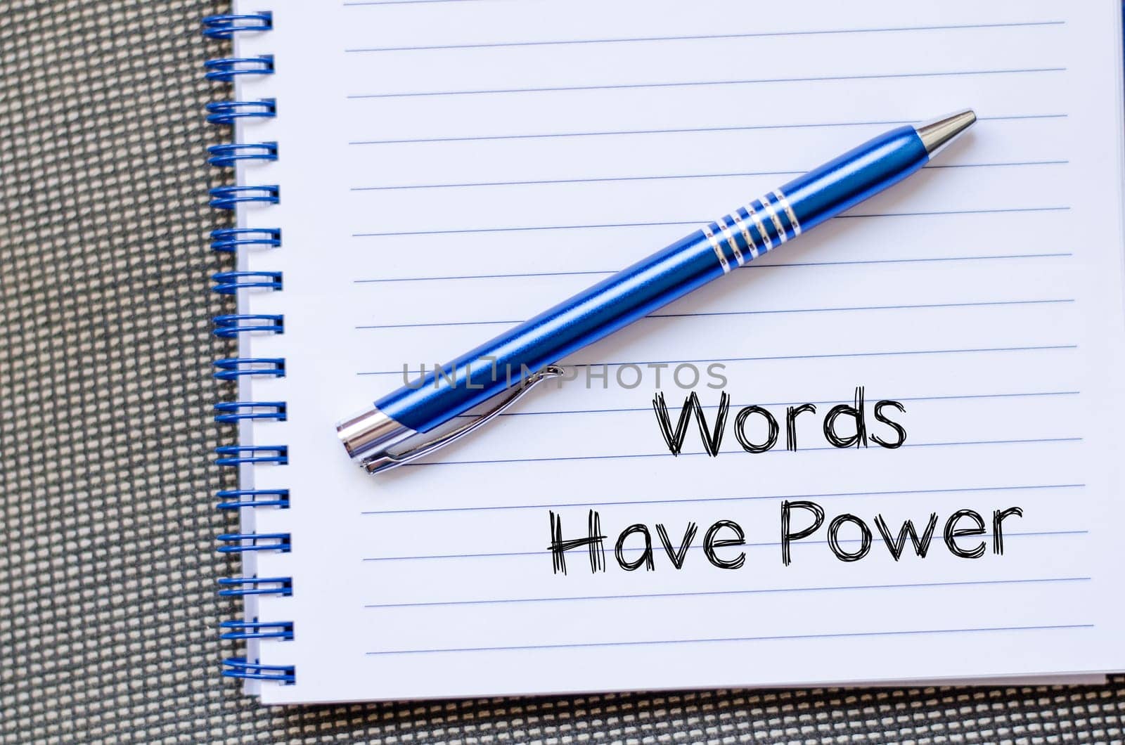 Words have power text concept write on notebook