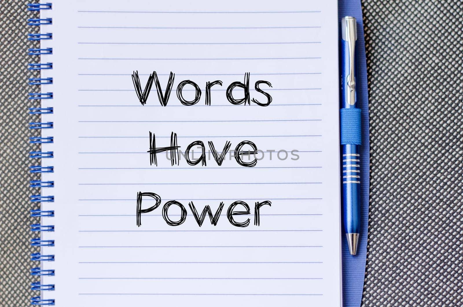 Words have power text concept write on notebook
