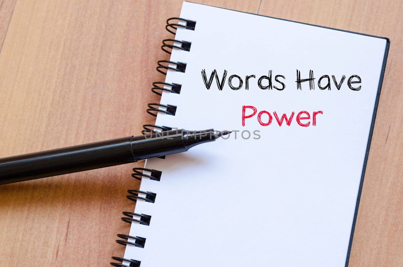 Words have power text concept write on notebook