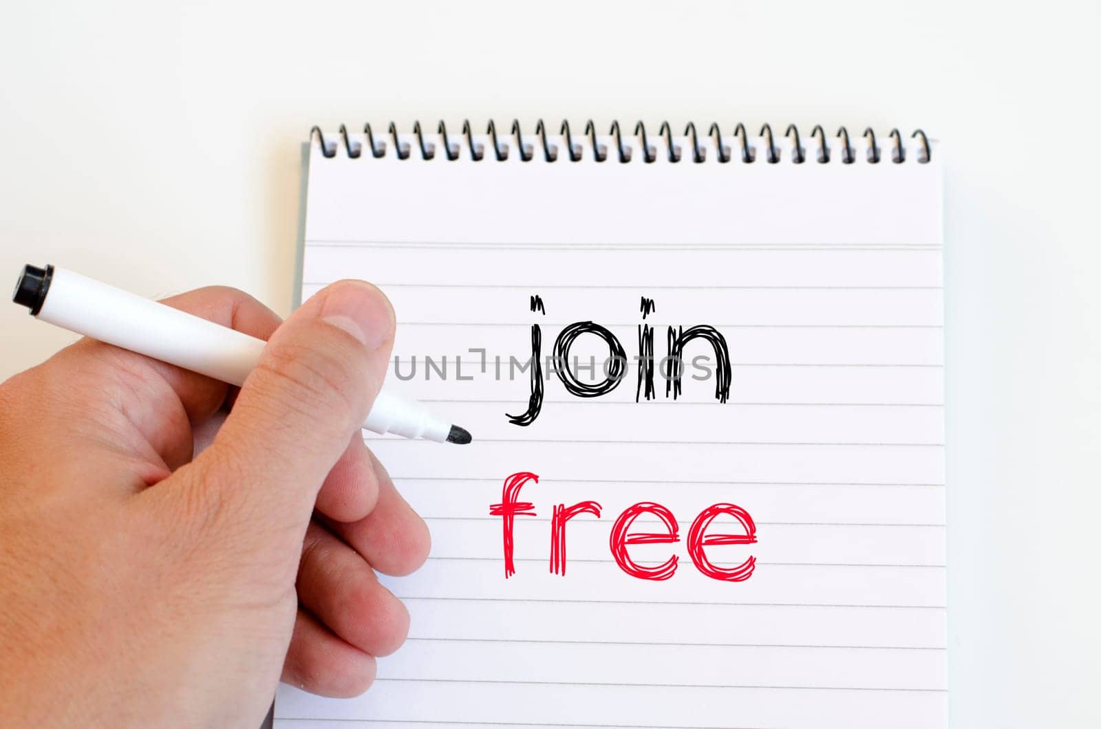 Human hand and notepad over white background