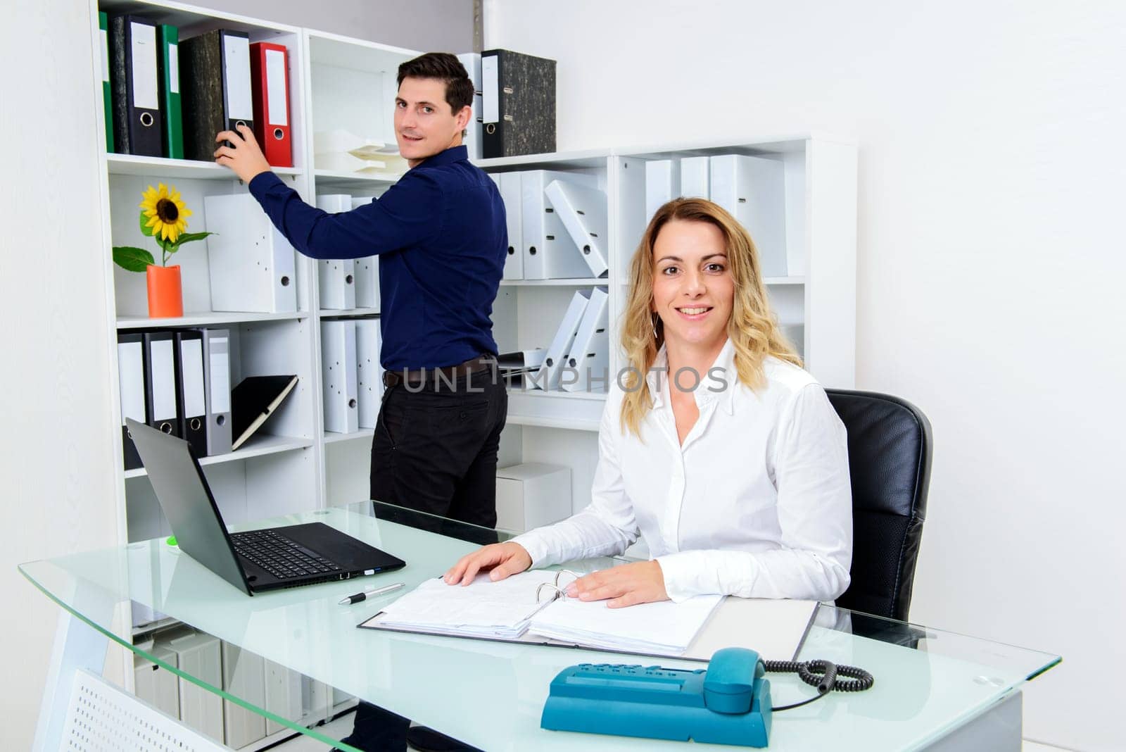 young businessman and businesswoman working together in the office