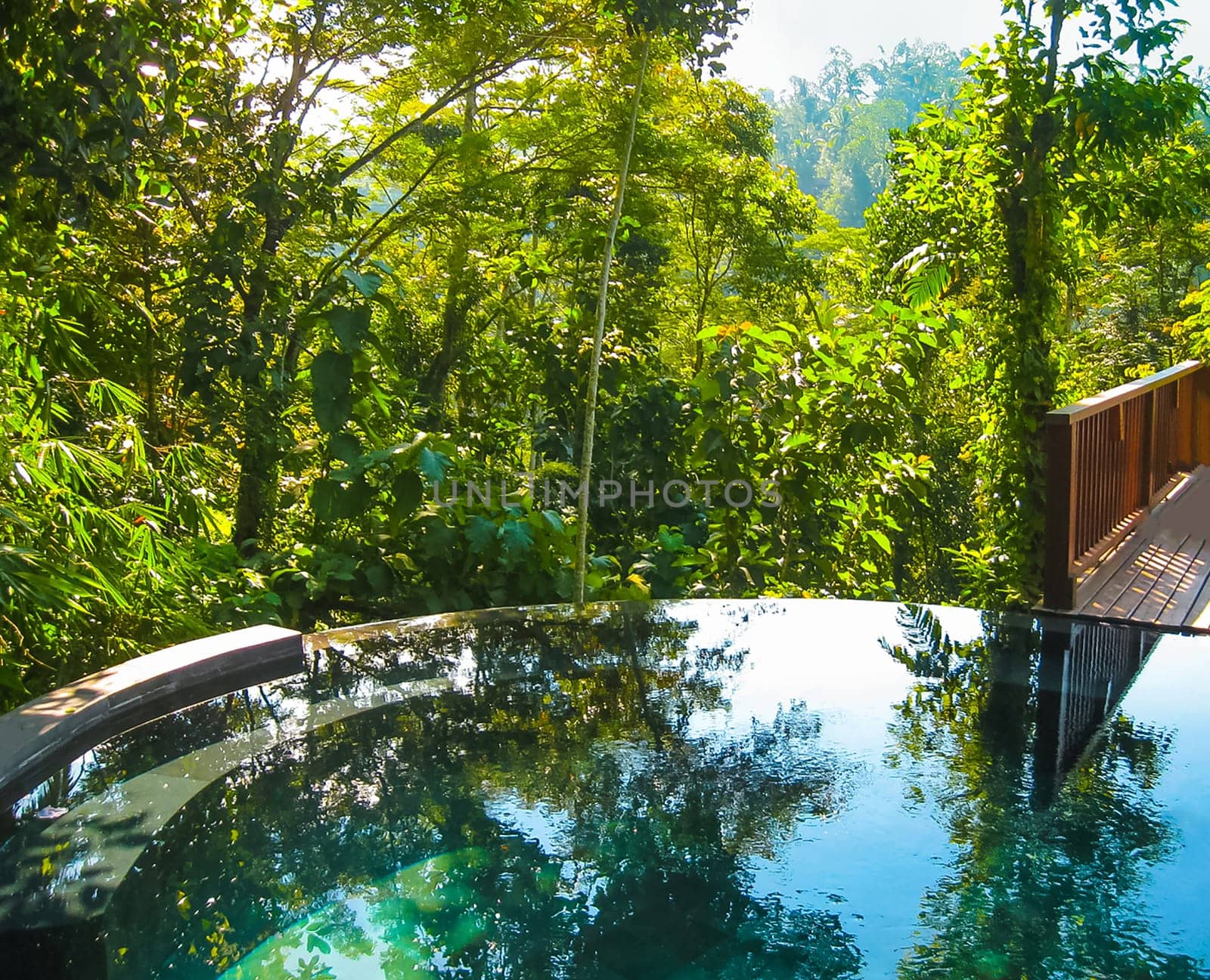 Bali, Indonesia - April 14, 2014: View of swimming pool at Nandini Bali Jungle Resort and Spa.