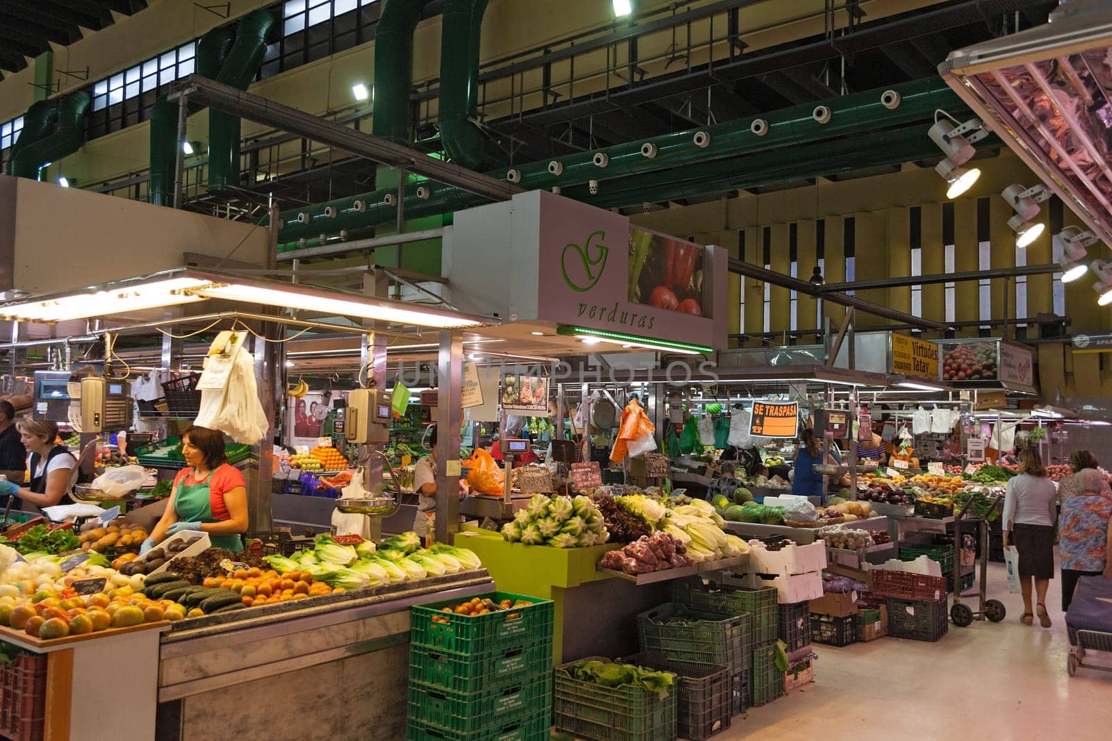 Sale stand in the market hall of Russafa in Valencia, Spain