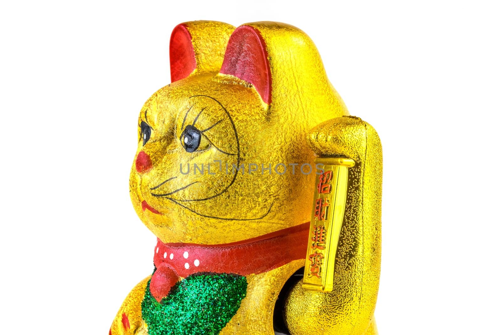 Waving cat,gold-plated welcome cat with waving paw against a white background