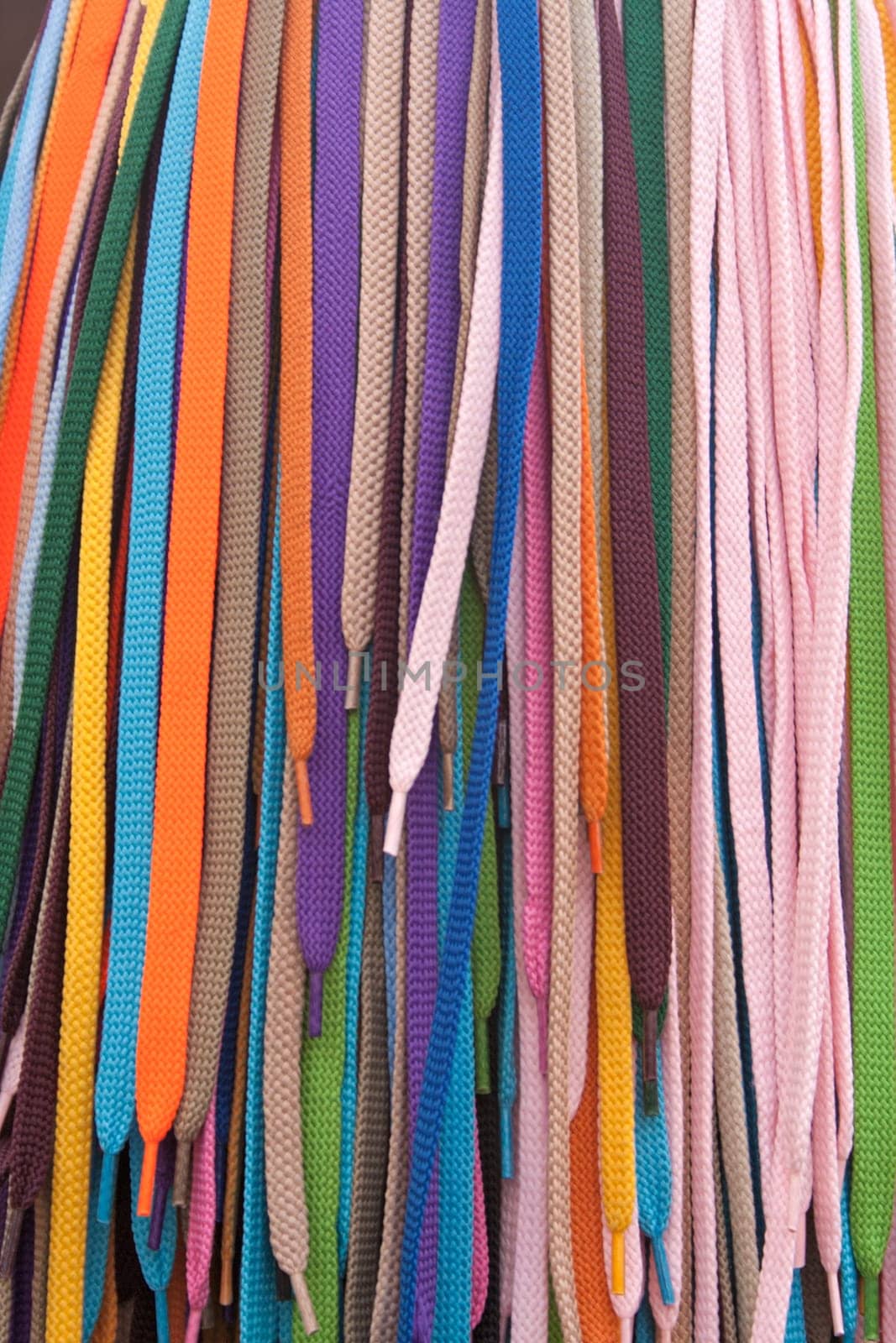Collection of many colorful shoelaces at a retail stand