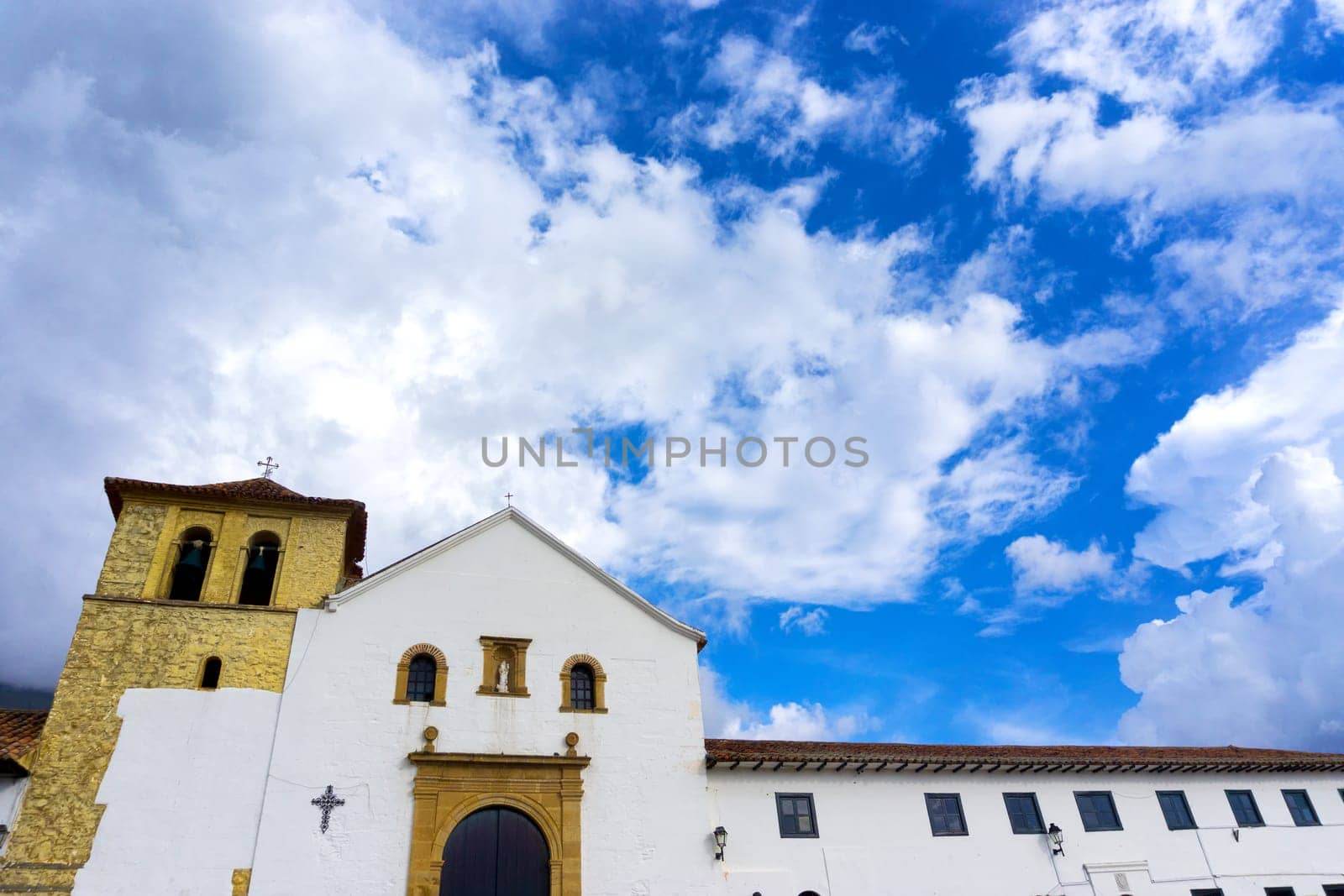 White colonial church on the Plaza Mayor in Villa de Leyva, Colombia