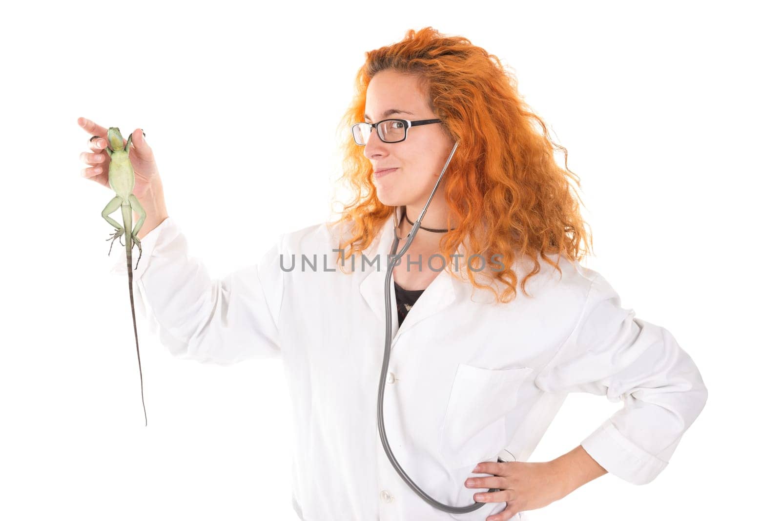 Veterinarian girl with lizard isolated in white