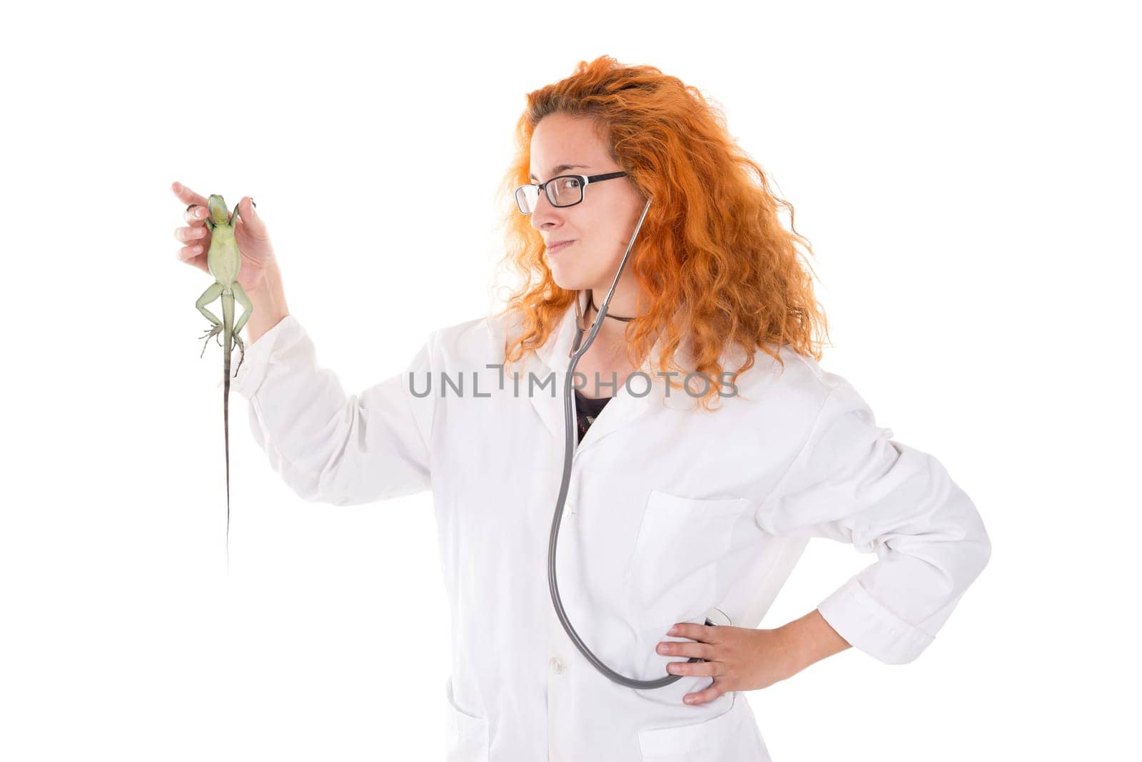 Veterinarian girl with lizard isolated in white