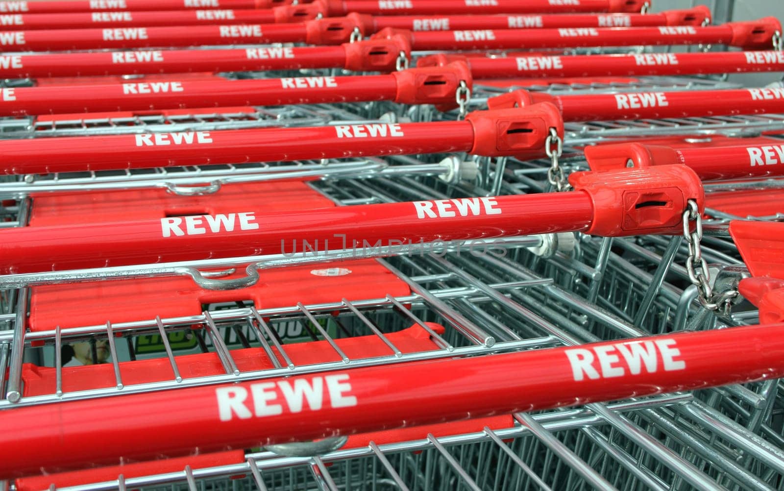 Shopping trolley with REWE company logo