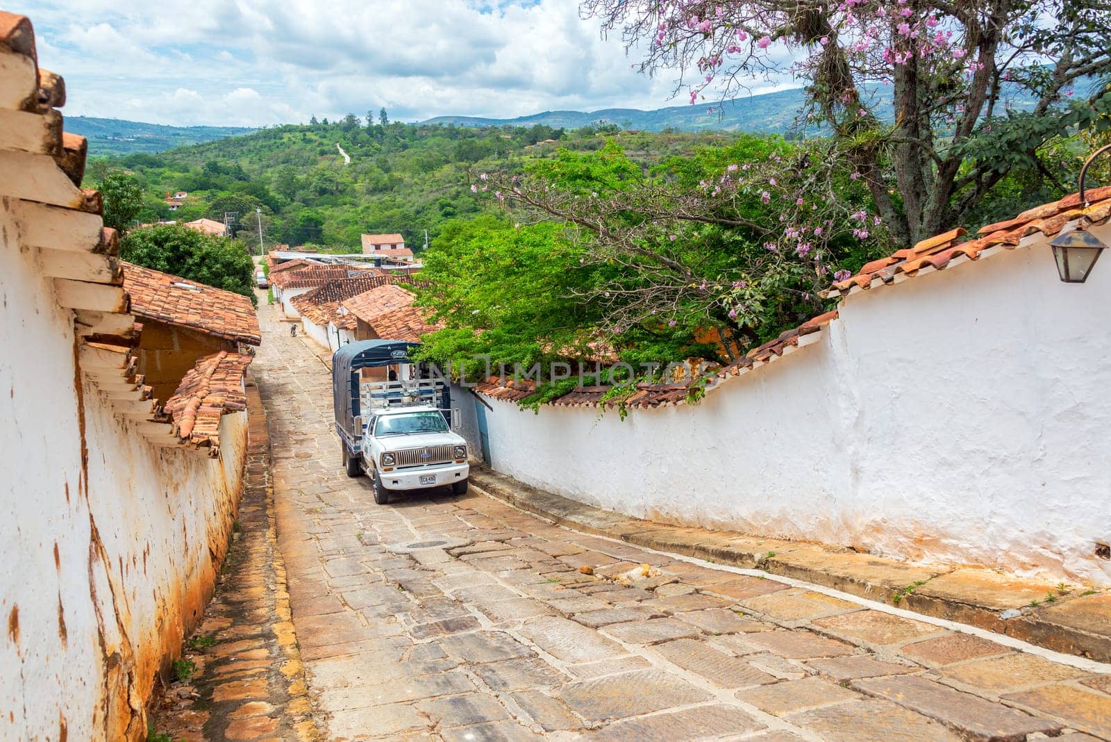 BARICHARA, COLOMBIA - MAY 5: Old truck parked on a colonial street in Barichara, Colombia on May 5, 2016
