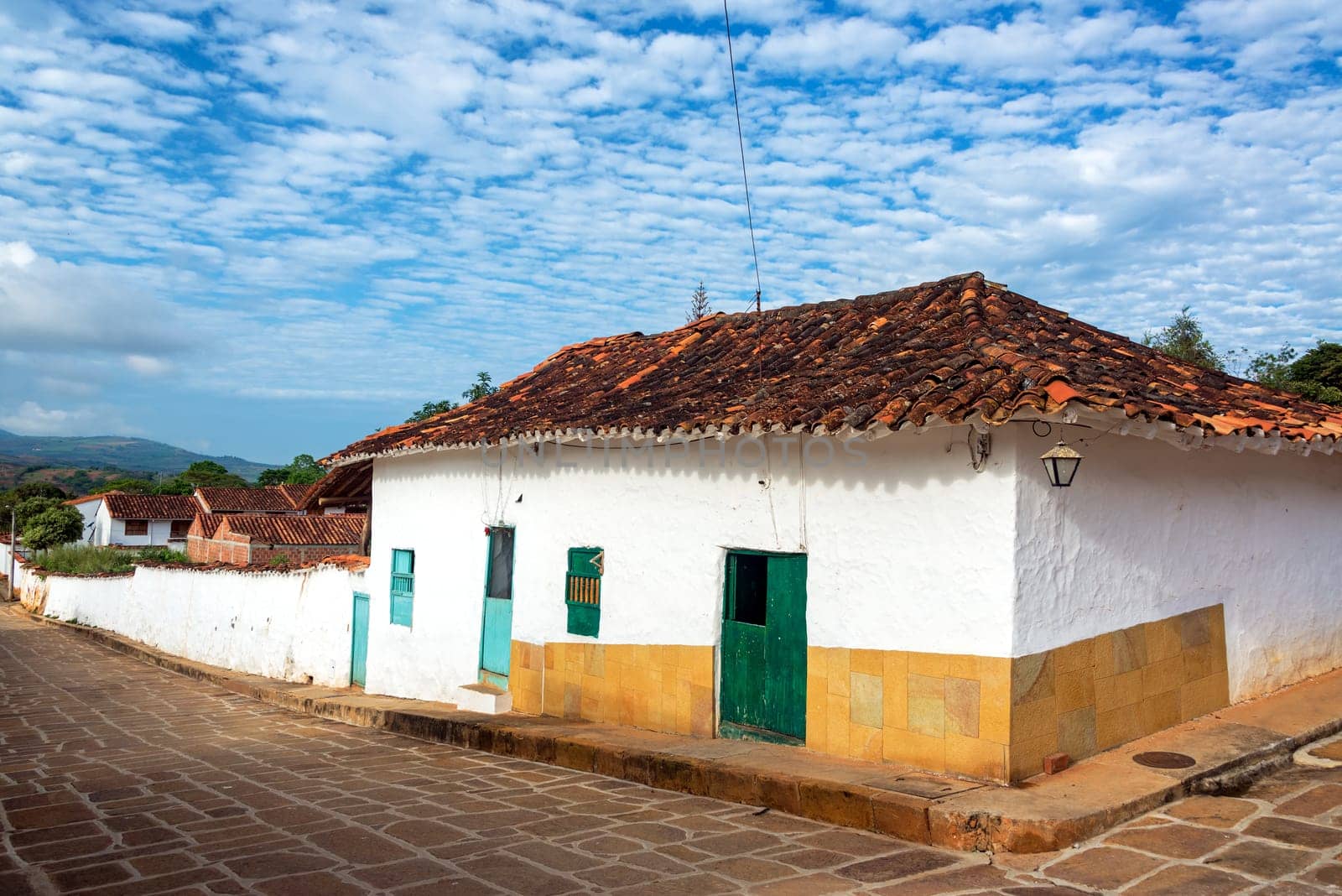 Colonial architecture on a street corner in the historic town of Barichara, Colombia