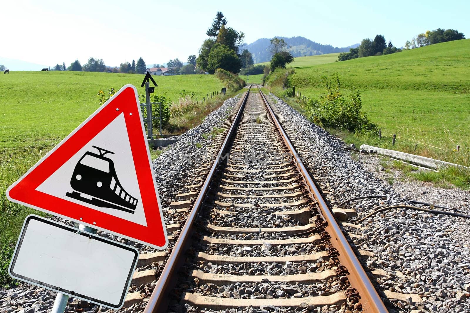 Die Deutsche Bahn. Railway sign and railway tracks