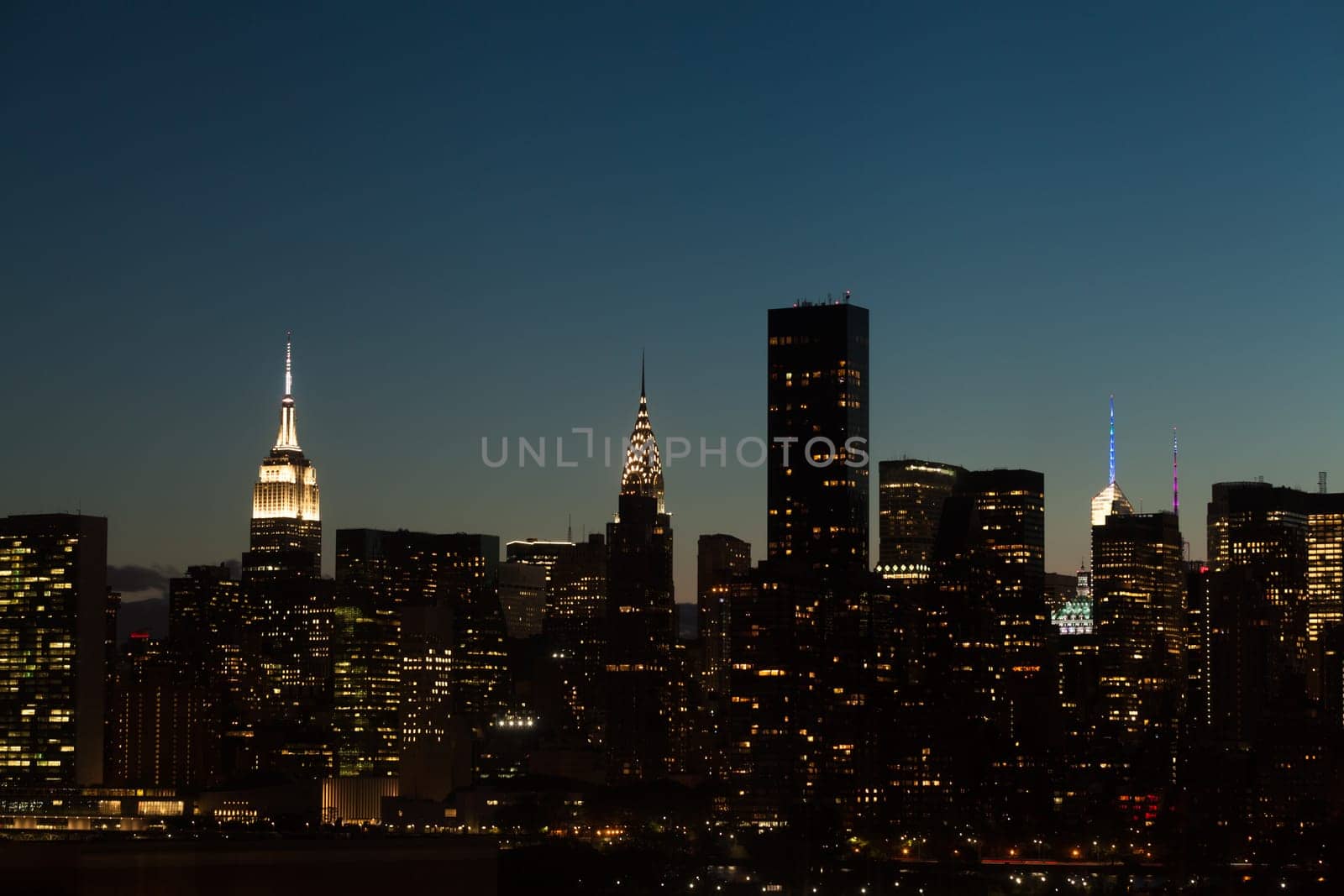 New York City Midtown Manhattan cityscape at night, USA.