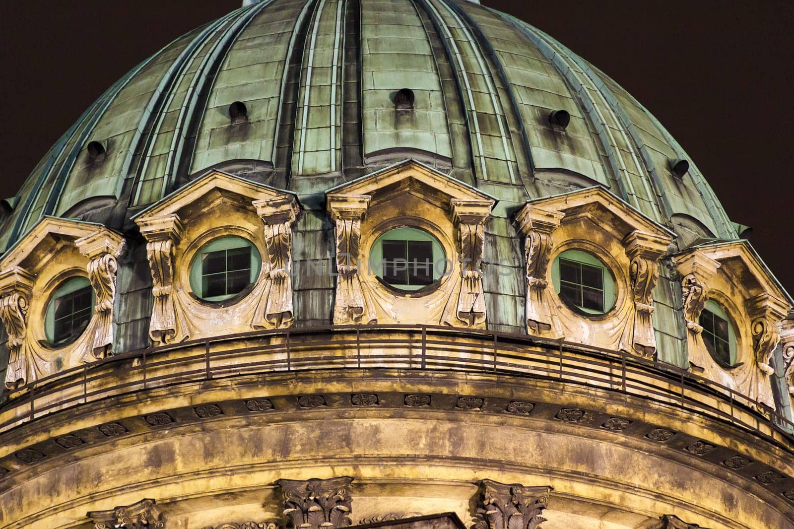 Fragment of old cathedral dome at night
