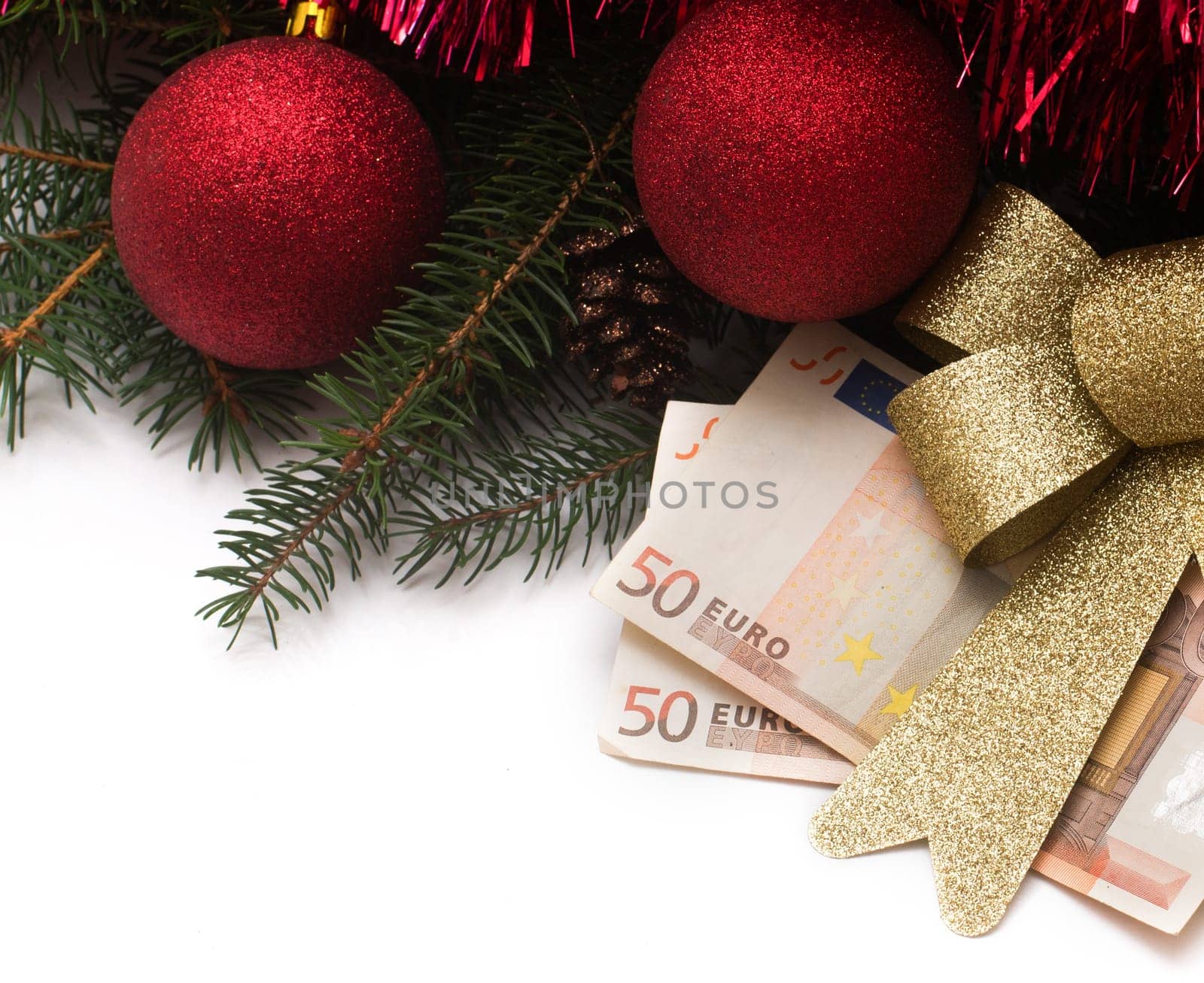 christmas gift box with euro money on white background