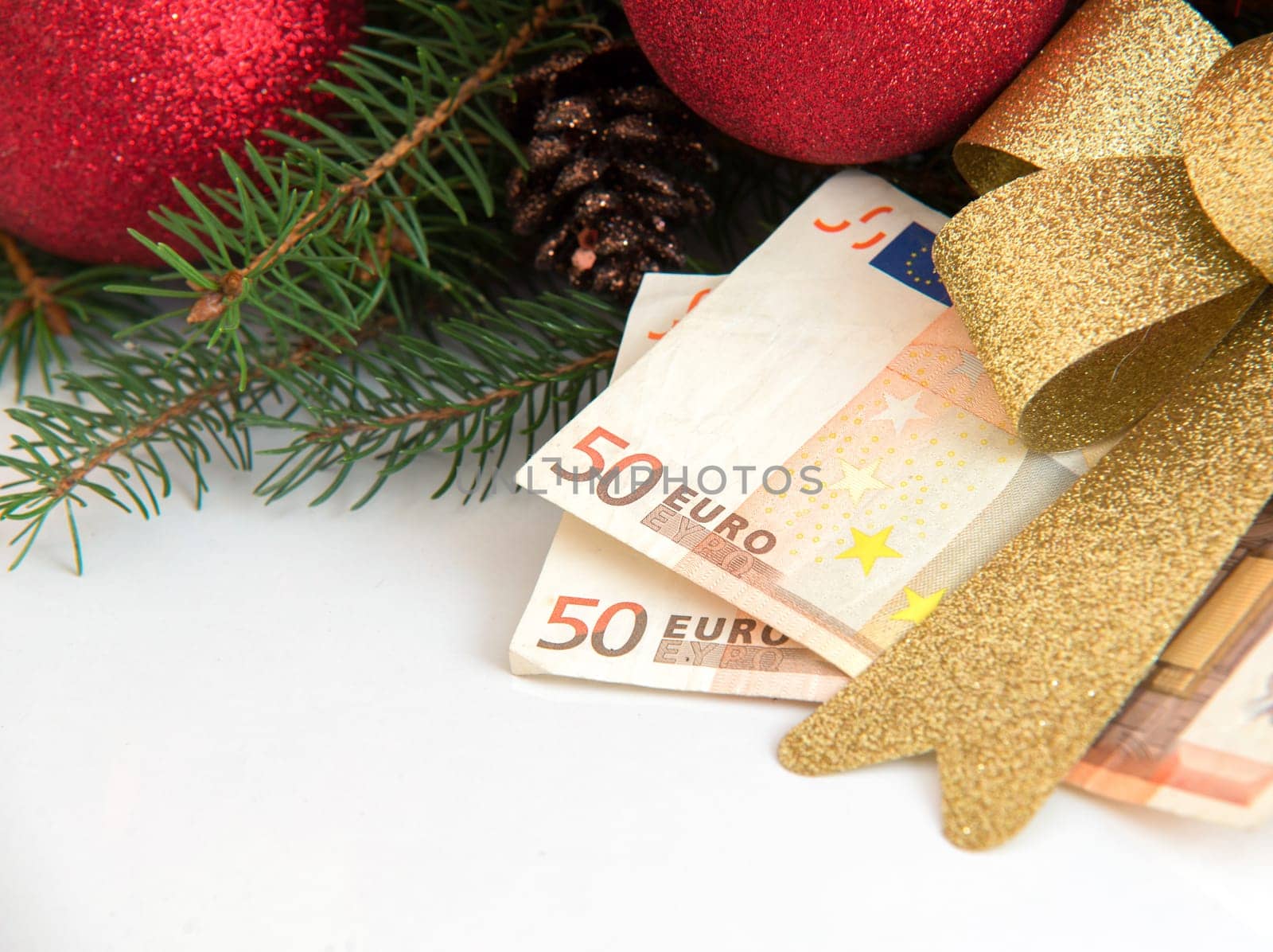 Christmas Gift box with Euro money on white background