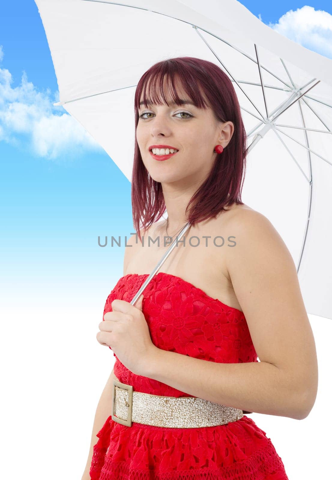 beautiful young woman with an umbrella on blue sky with clouds