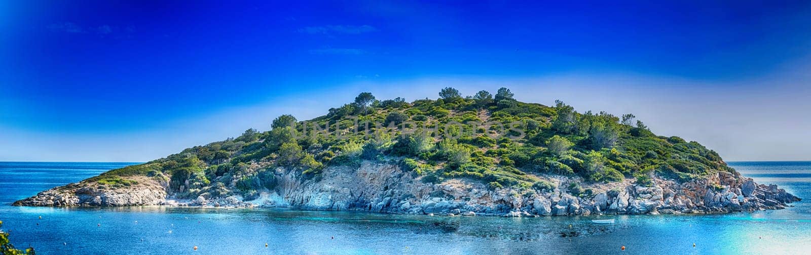 Panoramic views on the steep west coast of Mallorca in sunshine. Majorca. Balearic Islands. Spain..